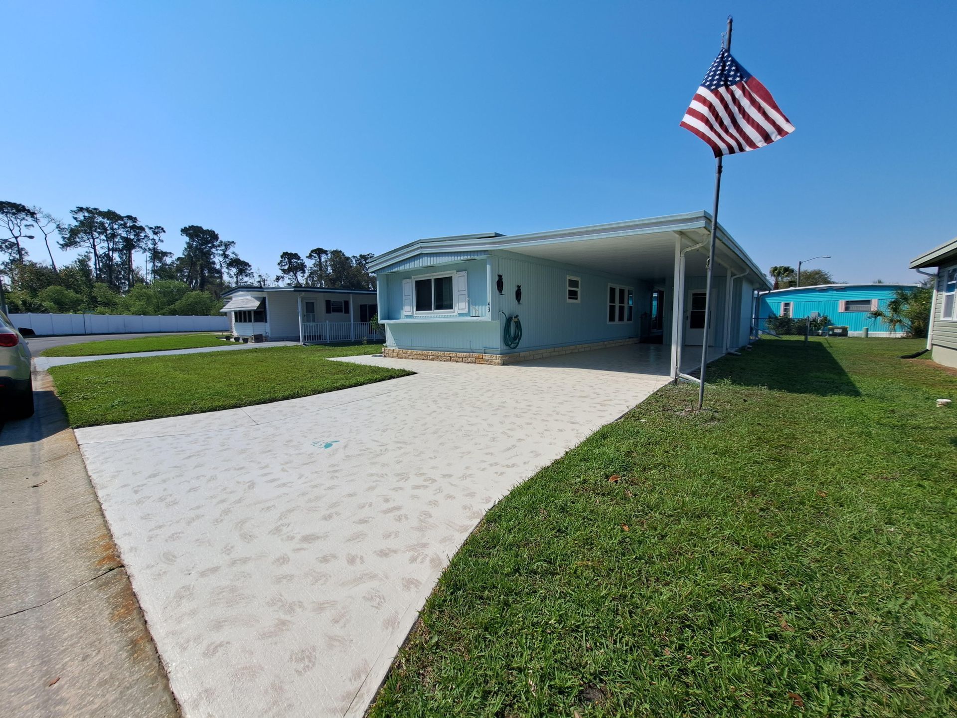 A house with an american flag in front of it