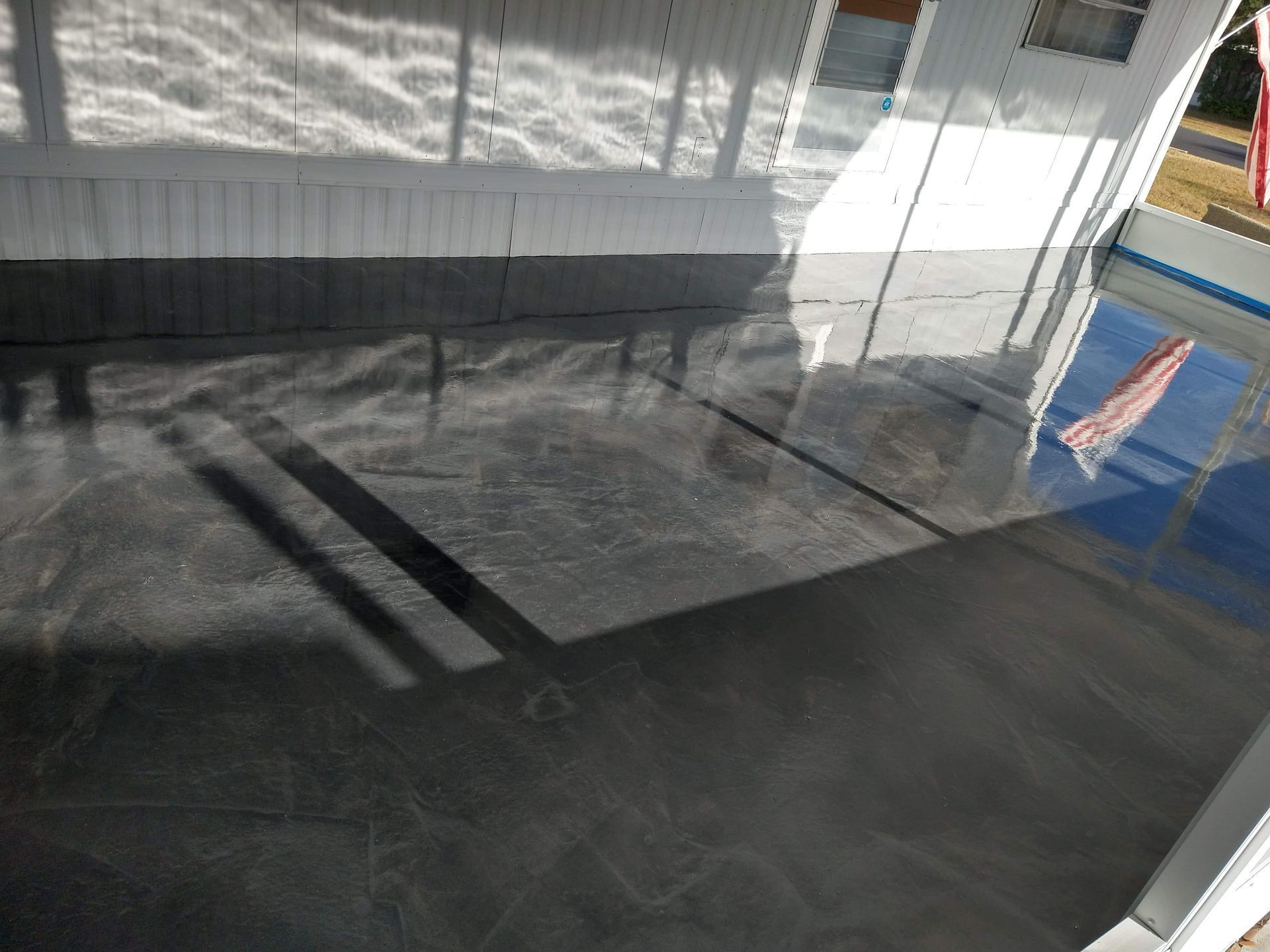 A reflection of a building in a glass window