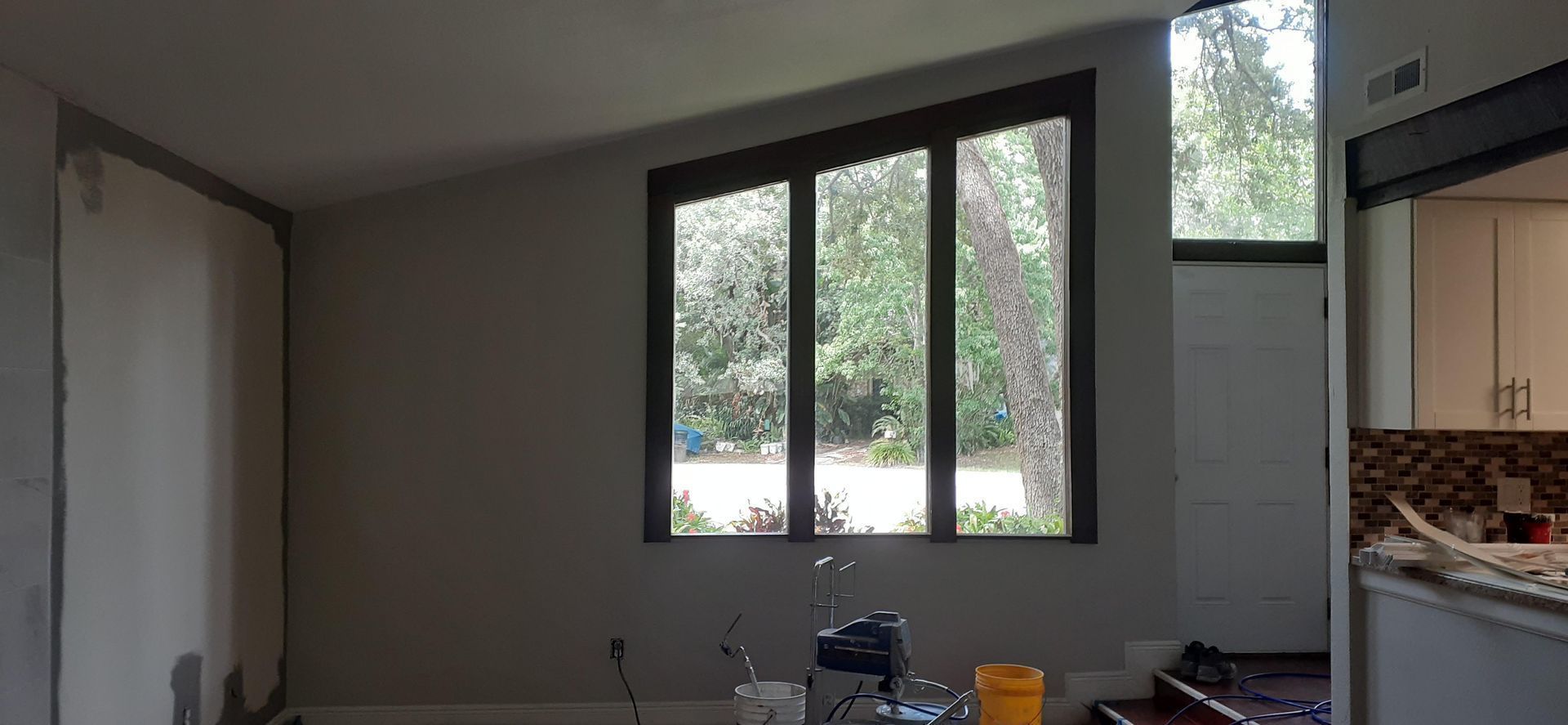 There is a large window in the middle of the room.