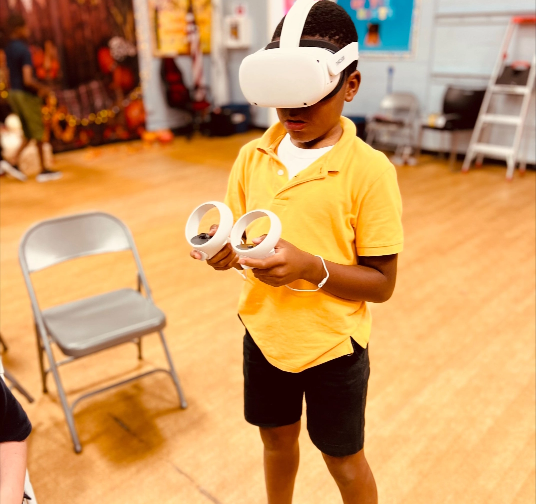 young boy wearing virtual reality headset