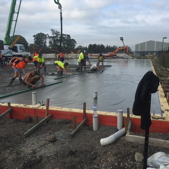 Workers Levelling Concrete — Concreting in Tanilba Bay, NSW