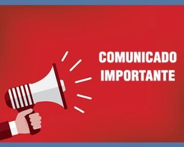 Uma mão segura um megafone com as palavras comunicado importante escritas nele.