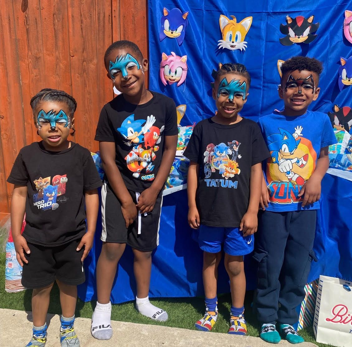 A group of children wearing sonic the hedgehog shirts