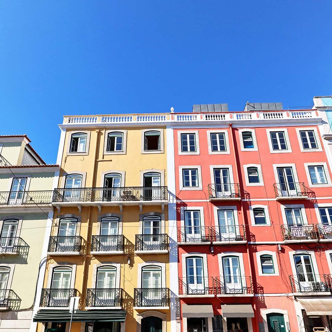 Expansive vista of Lisbon's picturesque architecture and lively neighbourhoods.