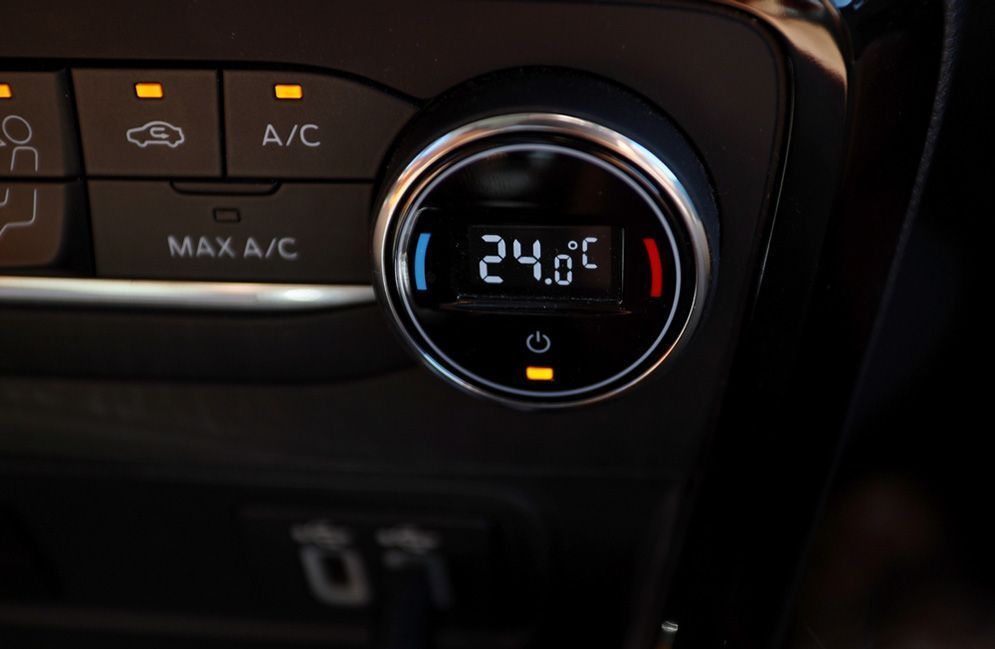 Car Climate Control Panel With Digital Display Set to 24.5°c — Fischer Automotive in Svensson Heights, QLD