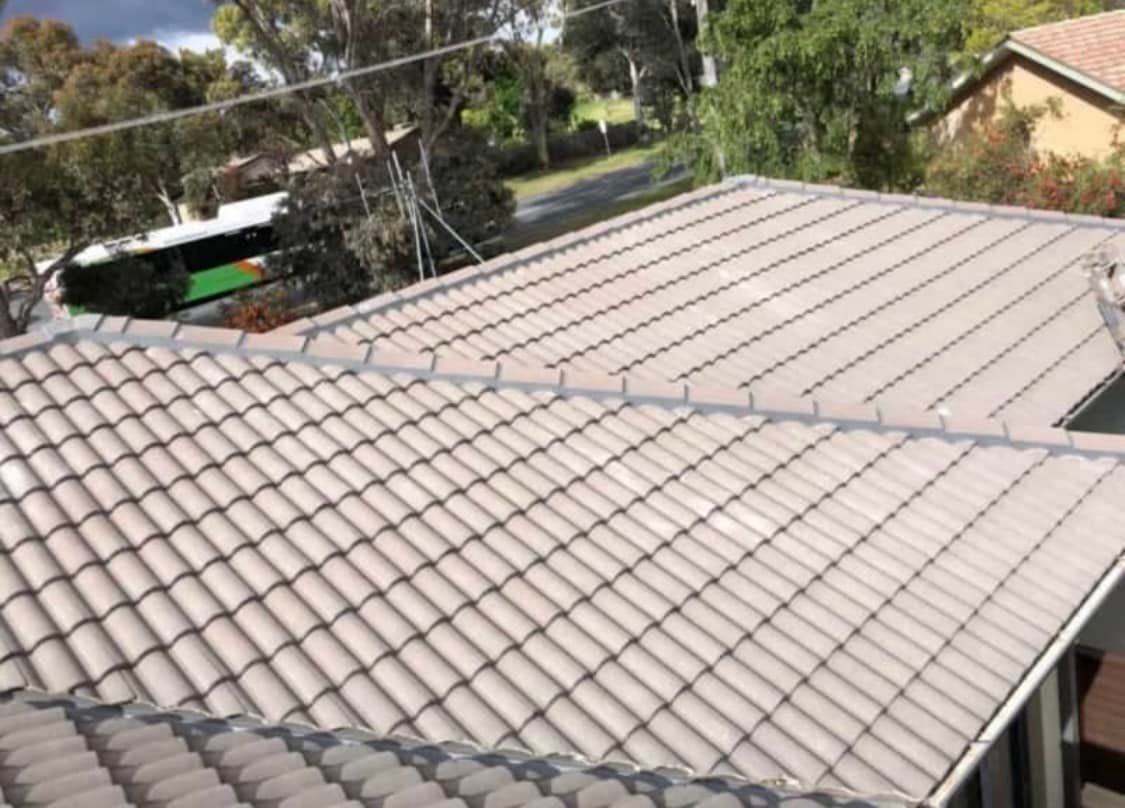 A Roof of a House With a Lot of Tiles on It — RJT Roofing In Bonner, ACT