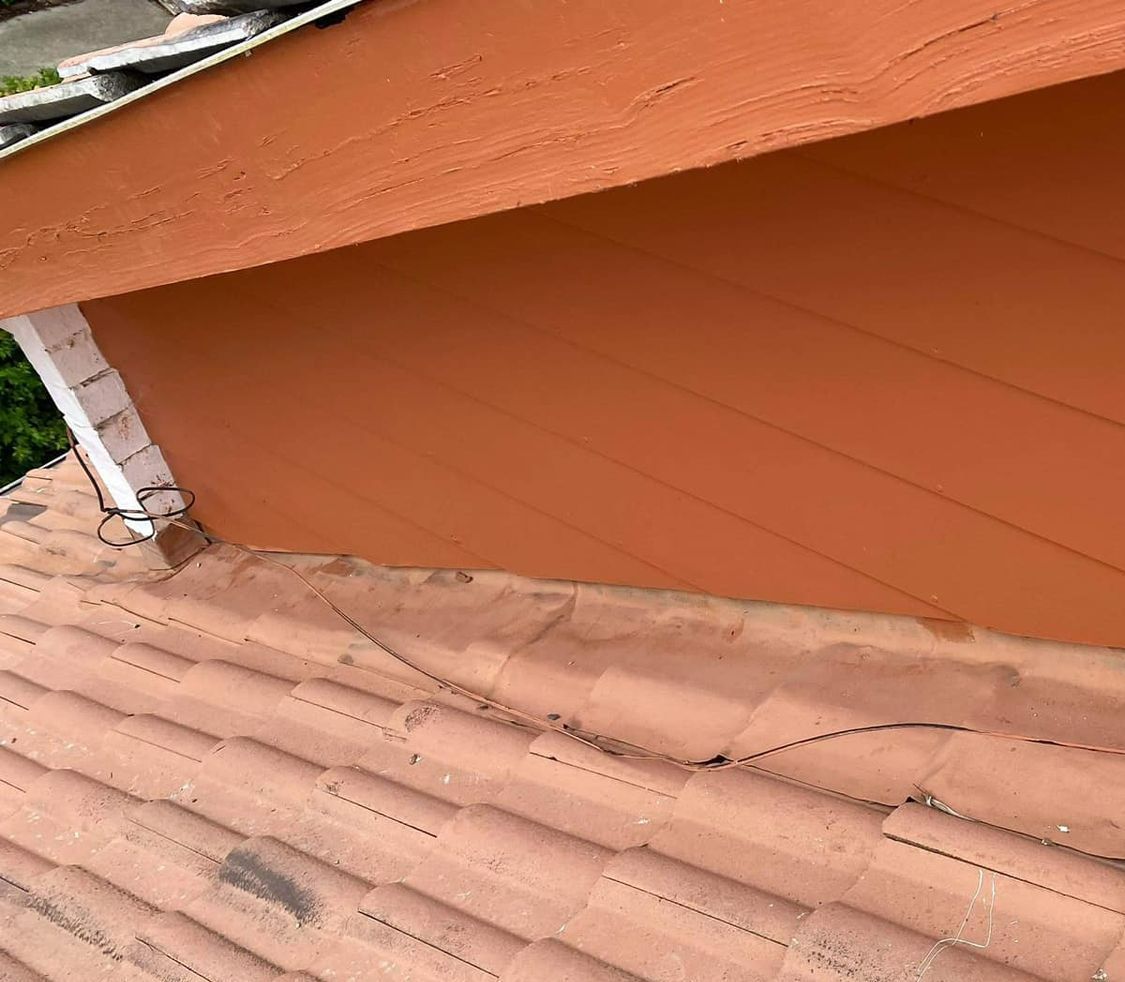 A Close Up of a Roof of a House With a Gutter on It — RJT Roofing In Bonner, ACT