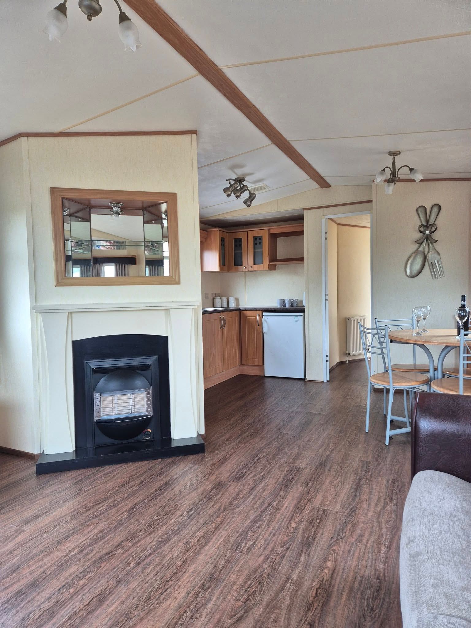 open living Kitchen space within a 2 bedroom ABI Brisbane holiday home for sale at Cotswold Grange Country Park