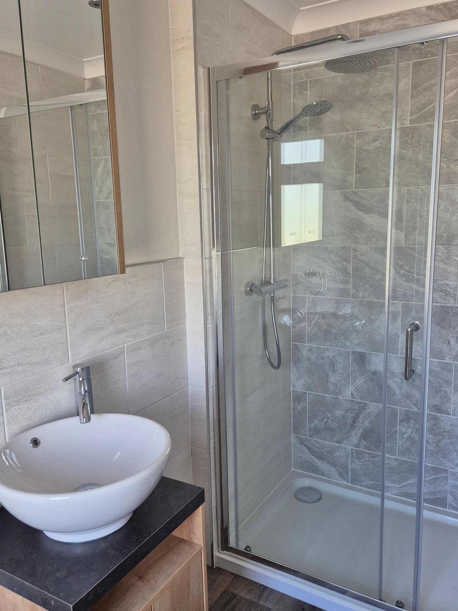 Bathroom within the beautiful Lodge for sale at Cotswold Grange Country Park