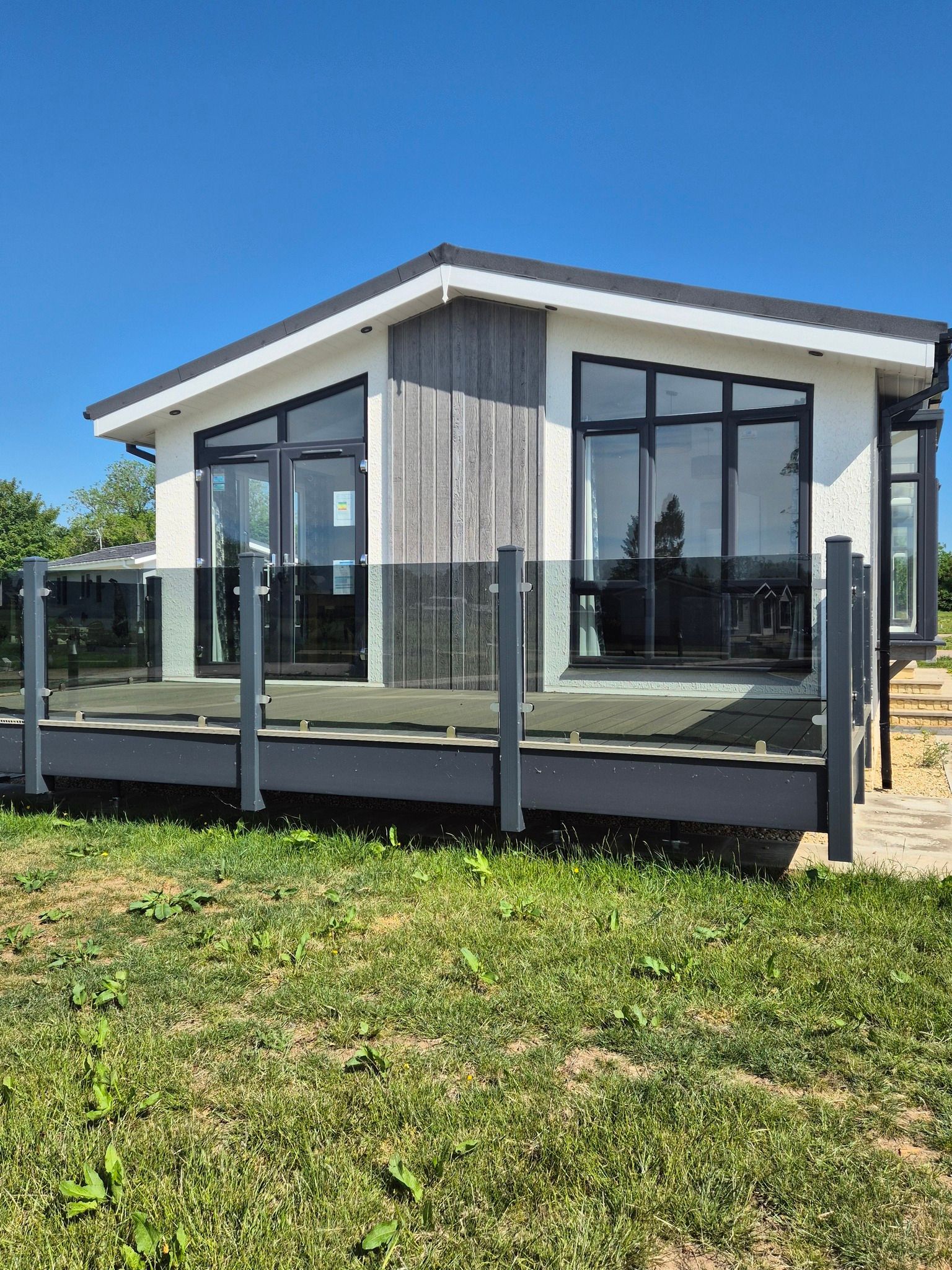 External view of the Charnwood Park Home for sale at Cotswold Grange Country Park