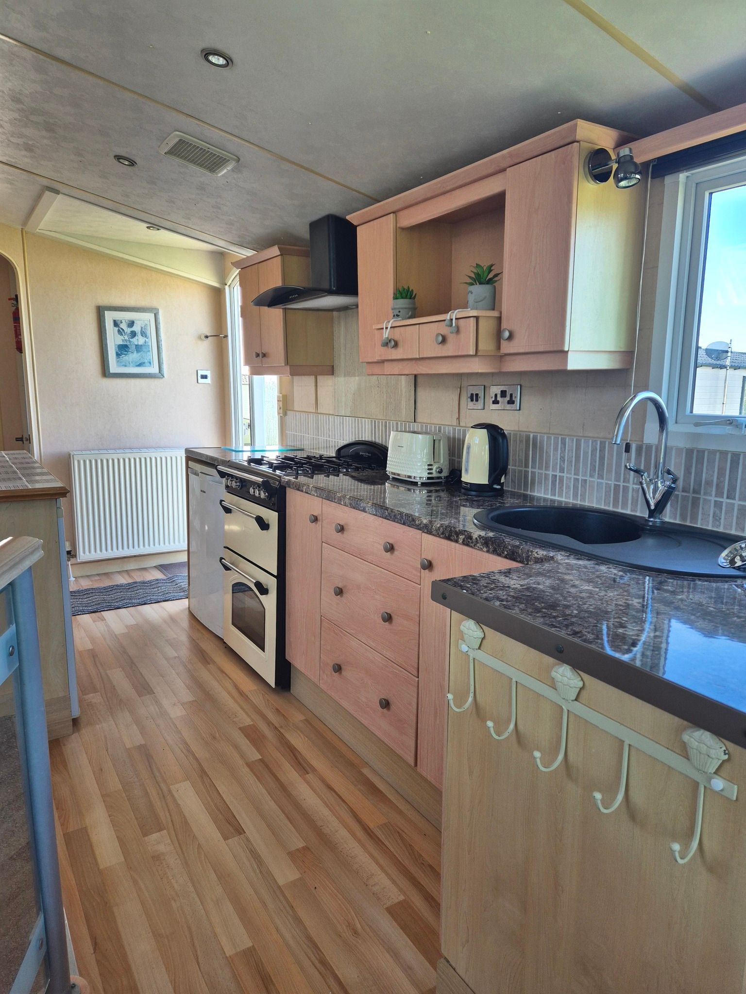 Kitchen space within a 2 bedroom Concept holiday home for sale by Cotswold Grange Country Park