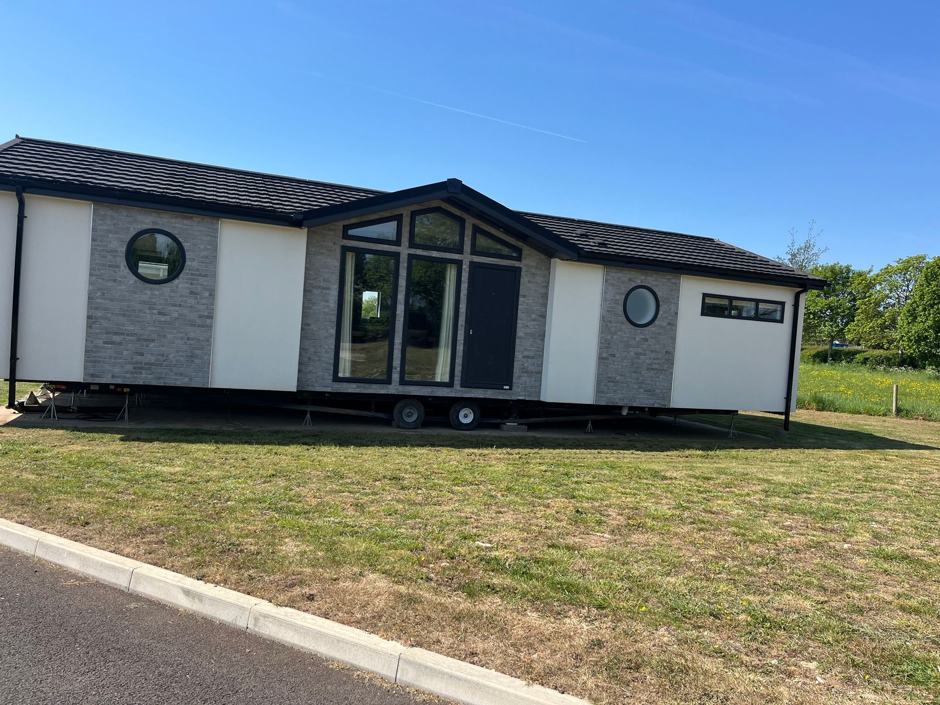 External view of the front of the Tingdene Park Home for sale at Cotswold Grange Country Park