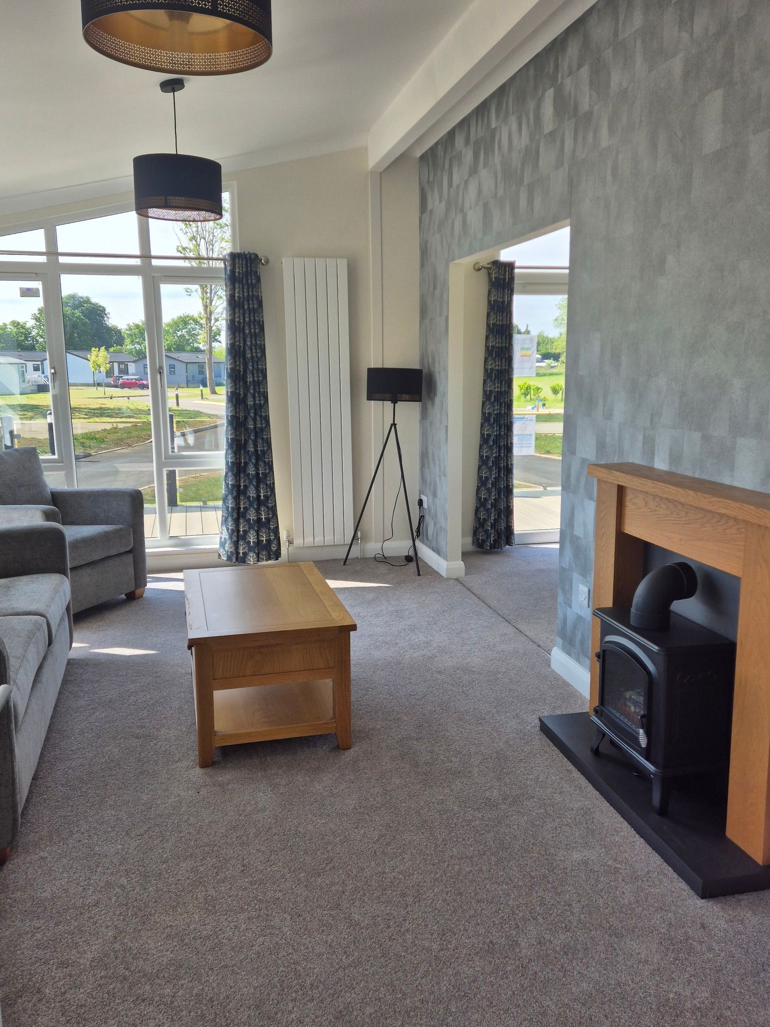 View of the lounge inside the Charnwood Park Home for sale at Cotswold Grange Country Park