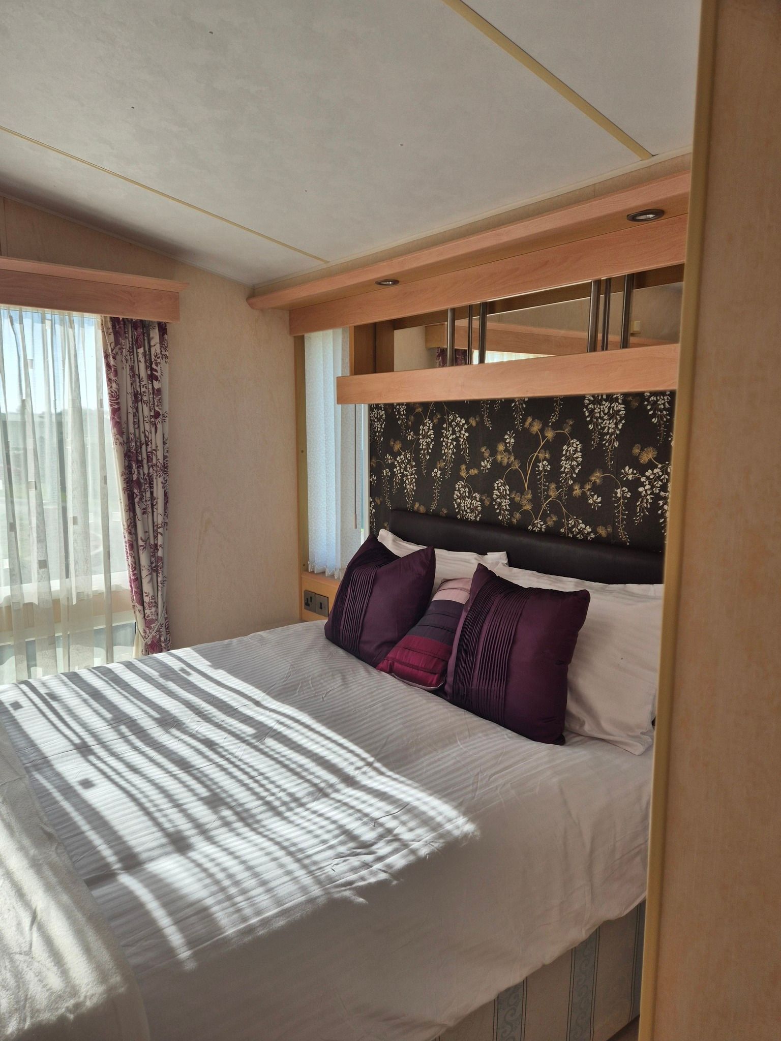 Main bedroom with double bed within a 2 bedroom Concept holiday home for sale by Cotswold Grange Country Park