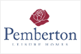 The logo for pemberton leisure homes has a red rose on it.