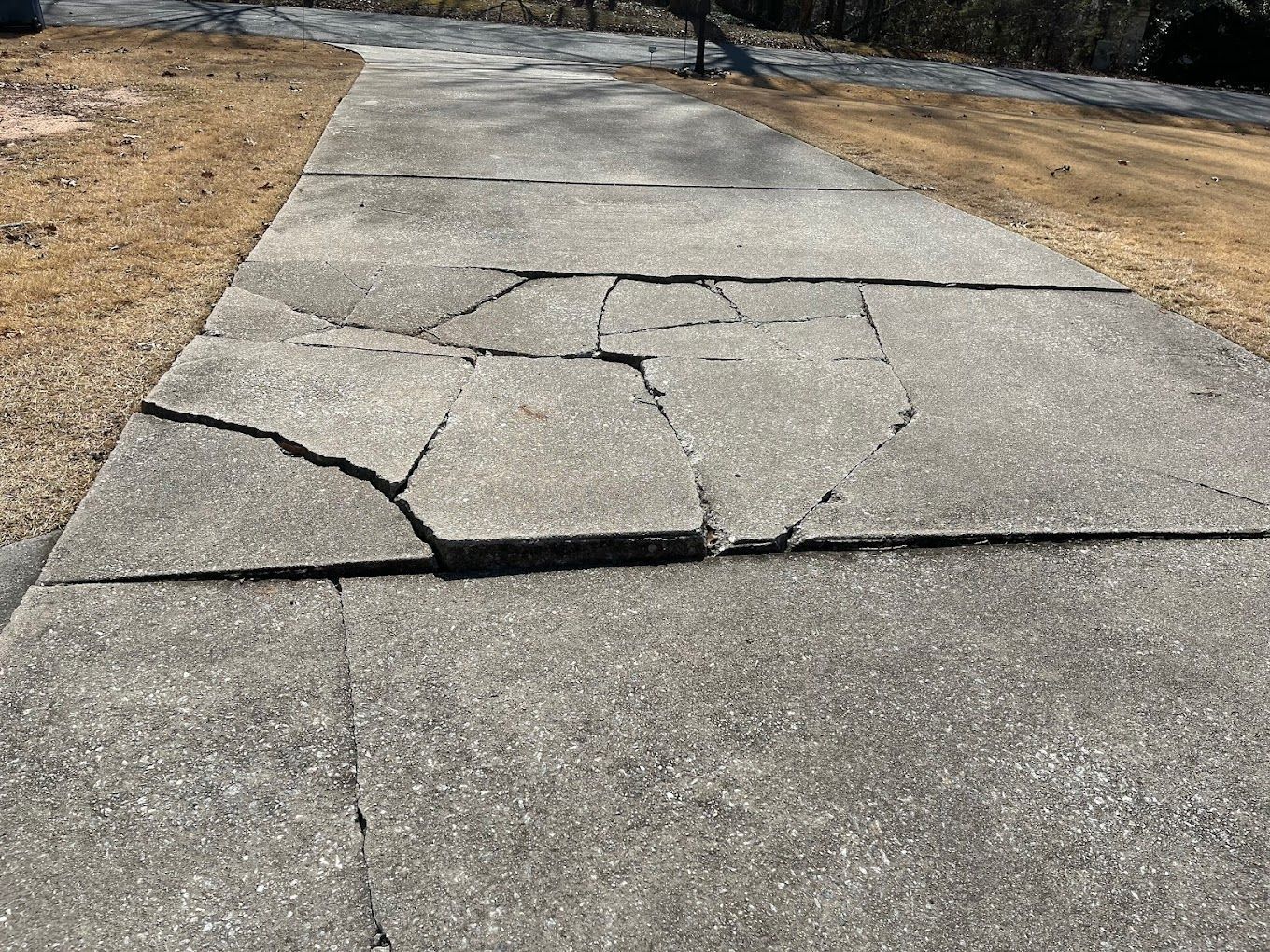 cracked concrete sidewalk