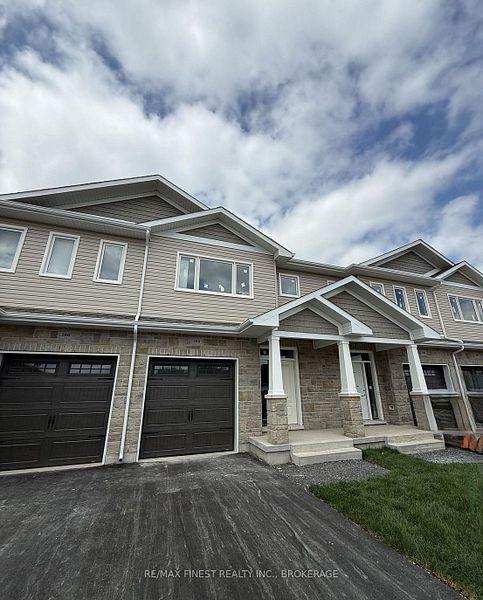 A black and white drawing of the front elevation of a house
