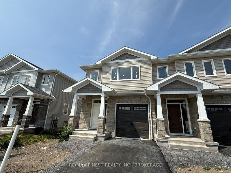A black and white drawing of a house with a front elevation