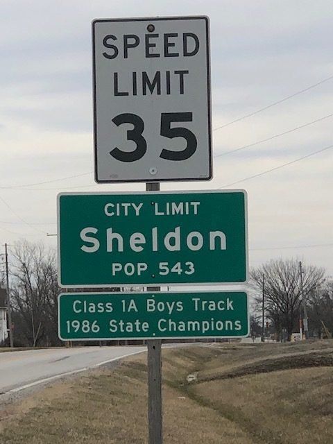 Sheldon city limit sign with 1986 champs