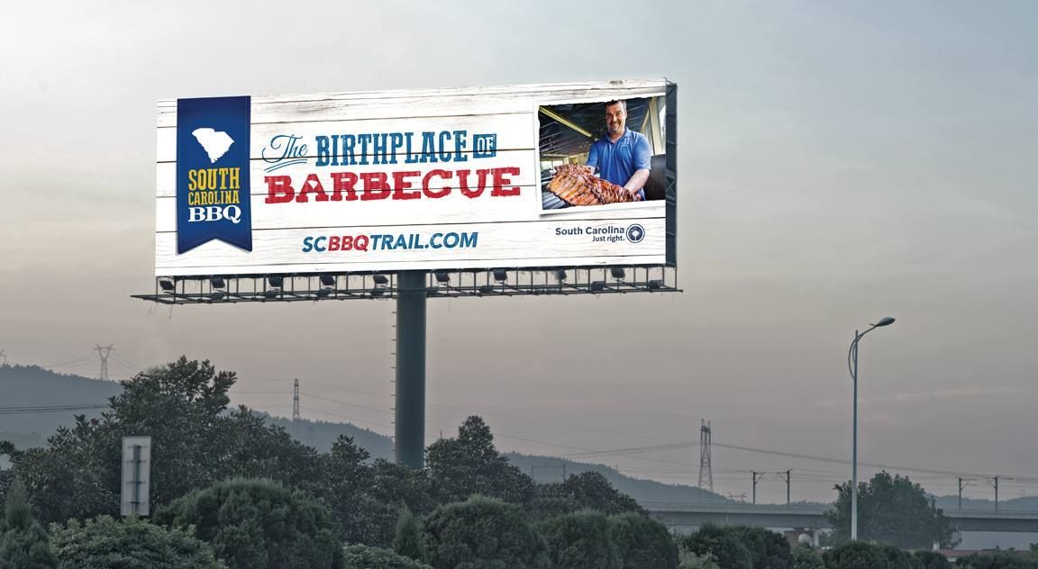 Billboard: South Carolina BBQ Trail, featuring a man serving BBQ.