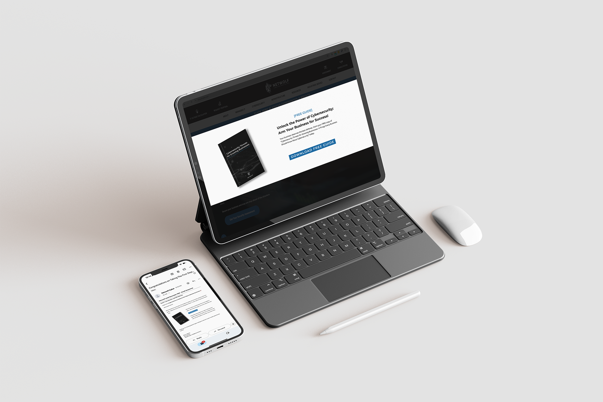 Laptop and phone displaying a website, with a mouse and stylus on a white surface.