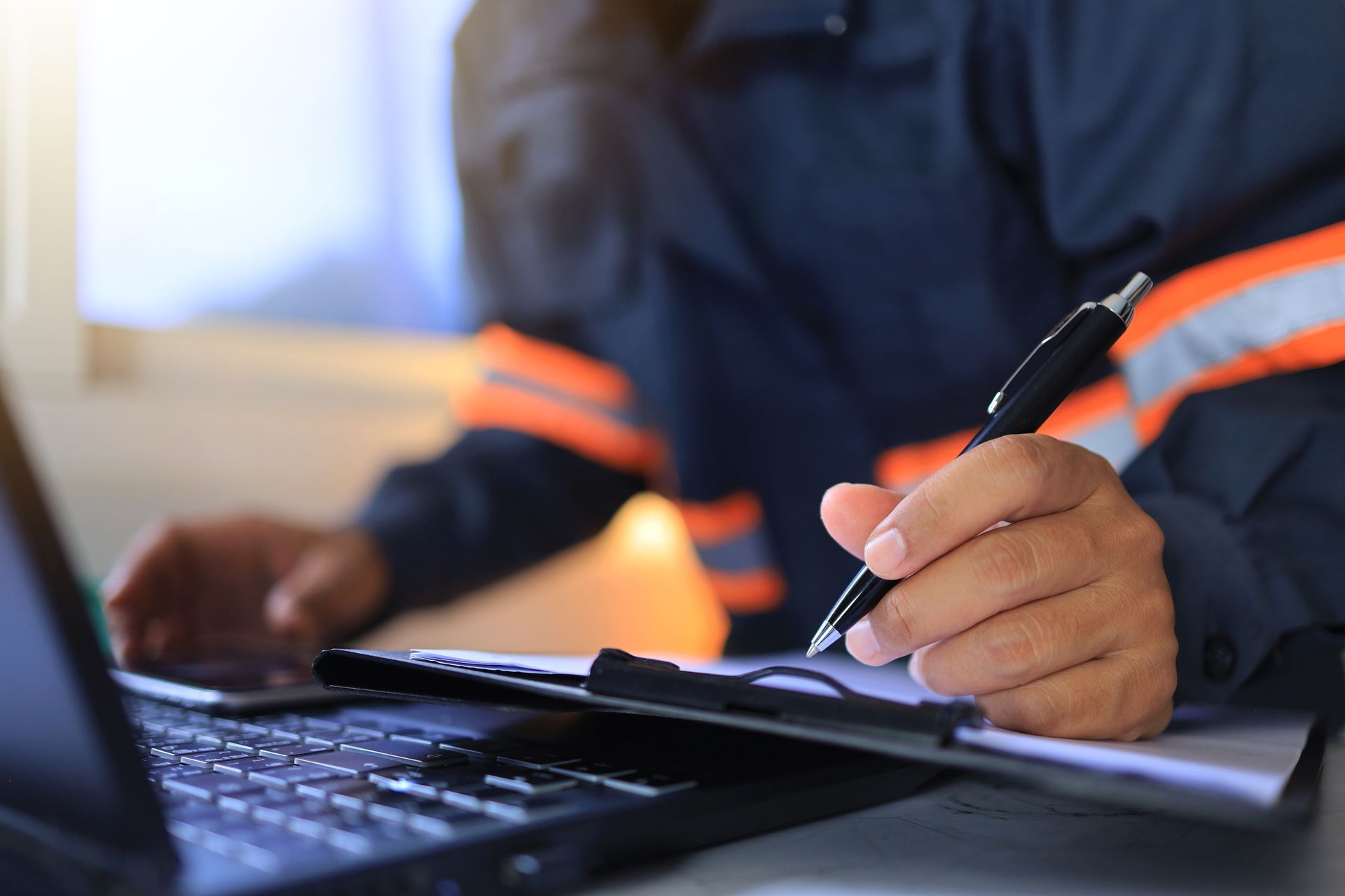 A worker reviewing a DOT audit.