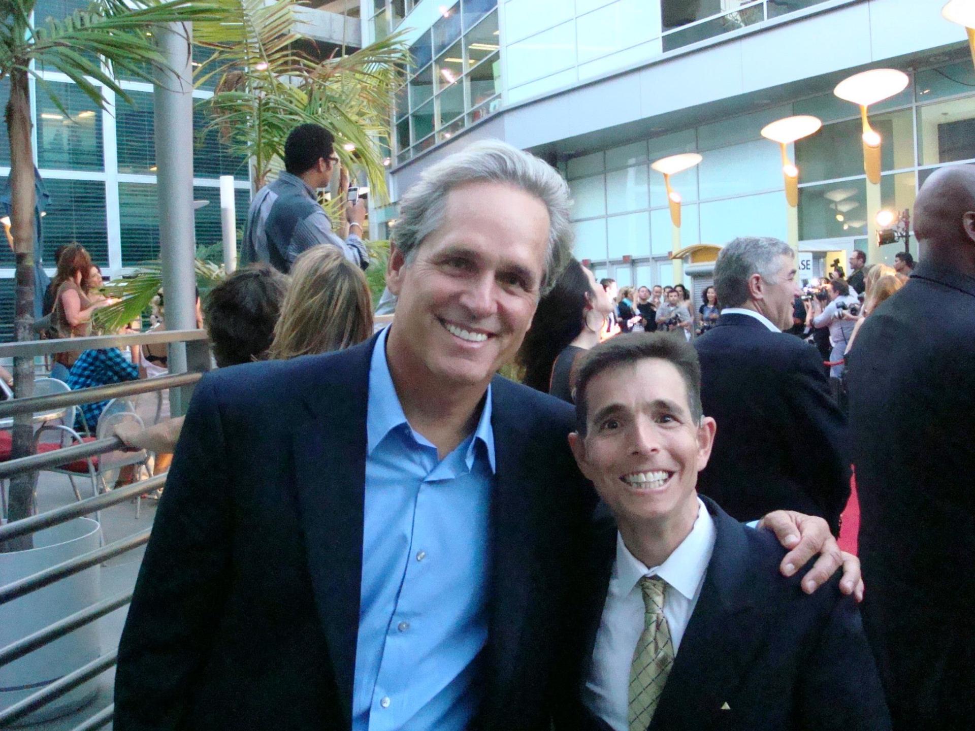 Walking with actor Gregory Harrison on the red carpet.