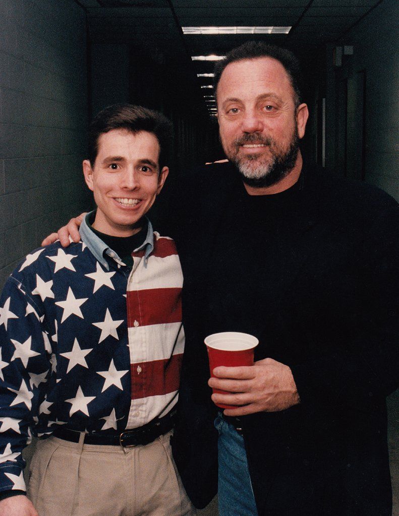 With singer Billy Joel.