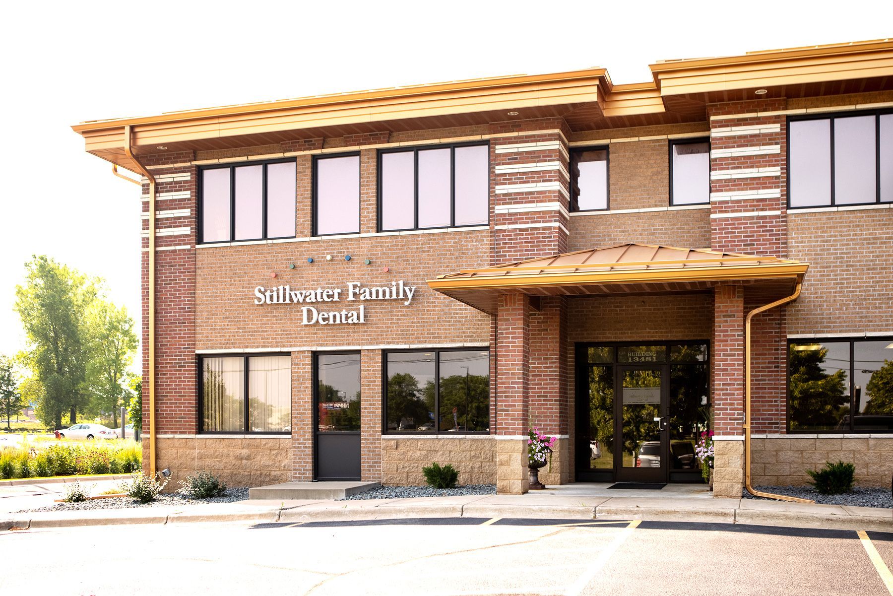 A brick building with a sign that says willatty family dental