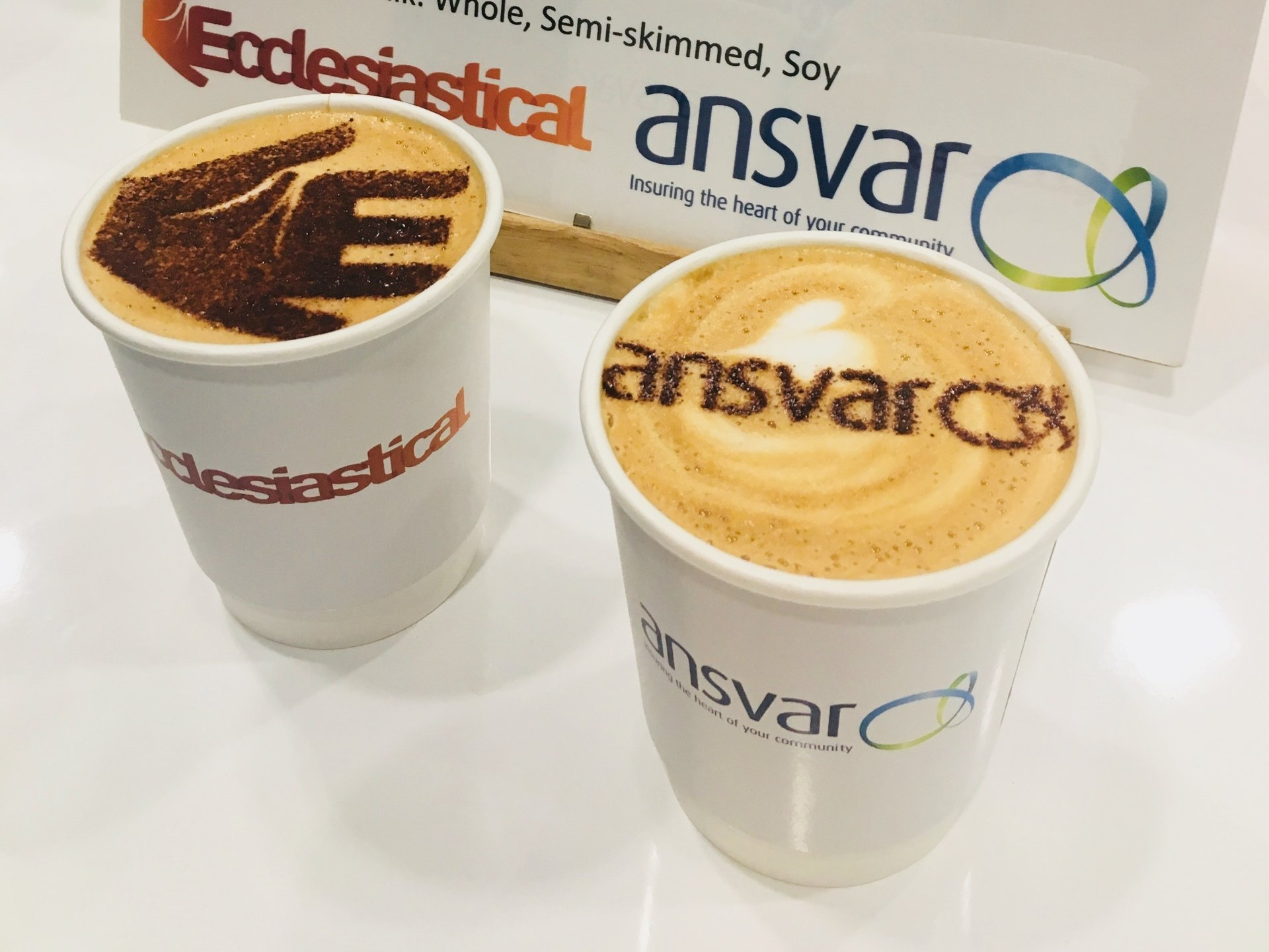 Branded coffee cup and stencil with logo