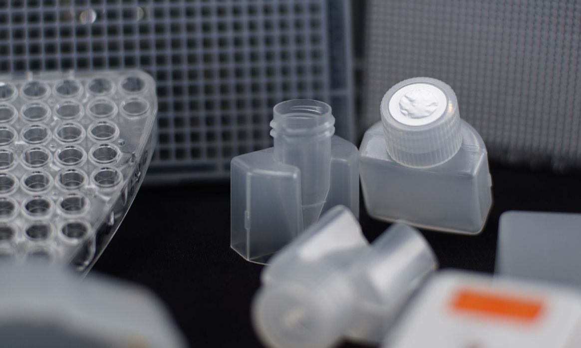 A group of plastic bottles sitting on top of a table