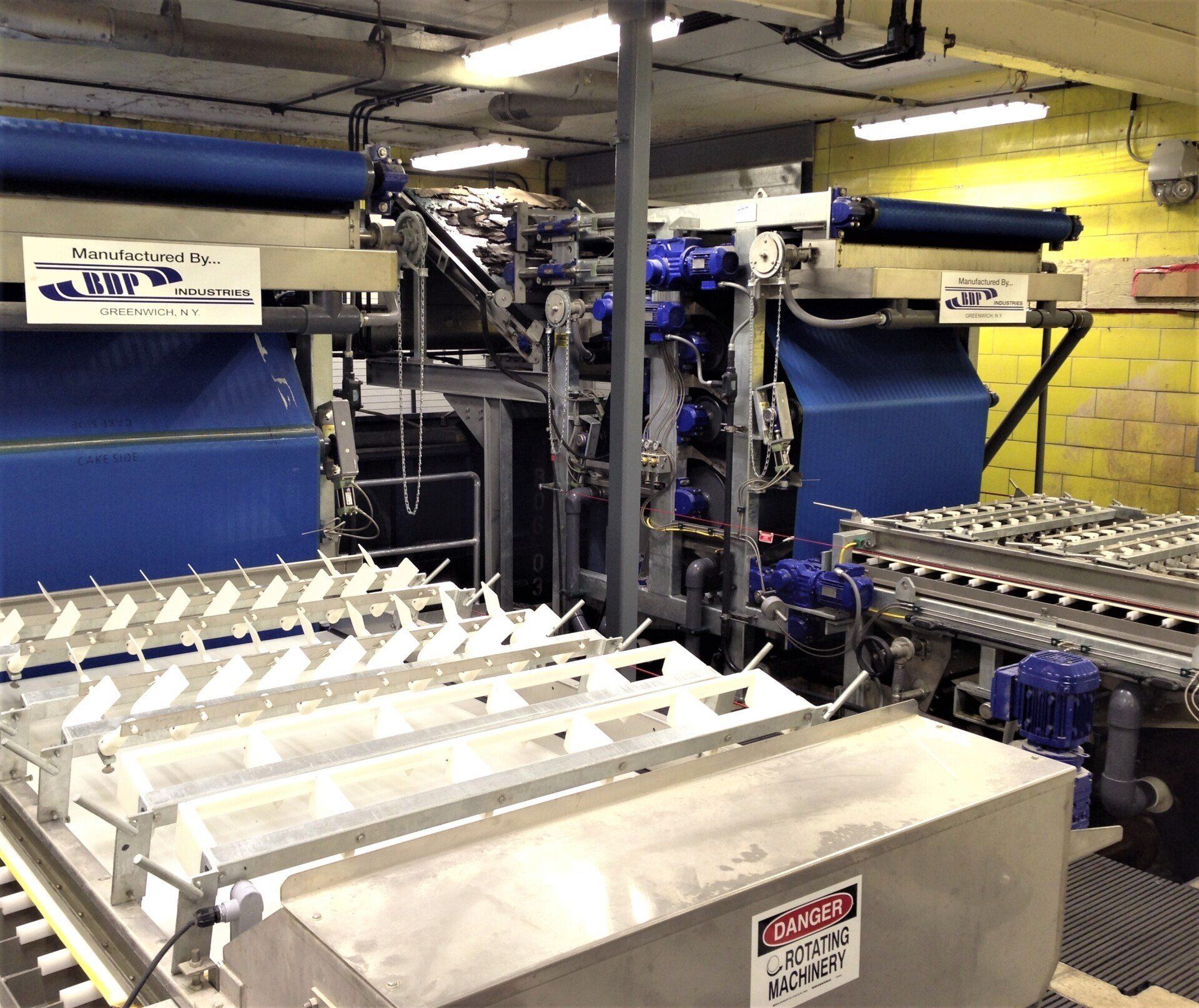 A machine with a sign that says warning on it