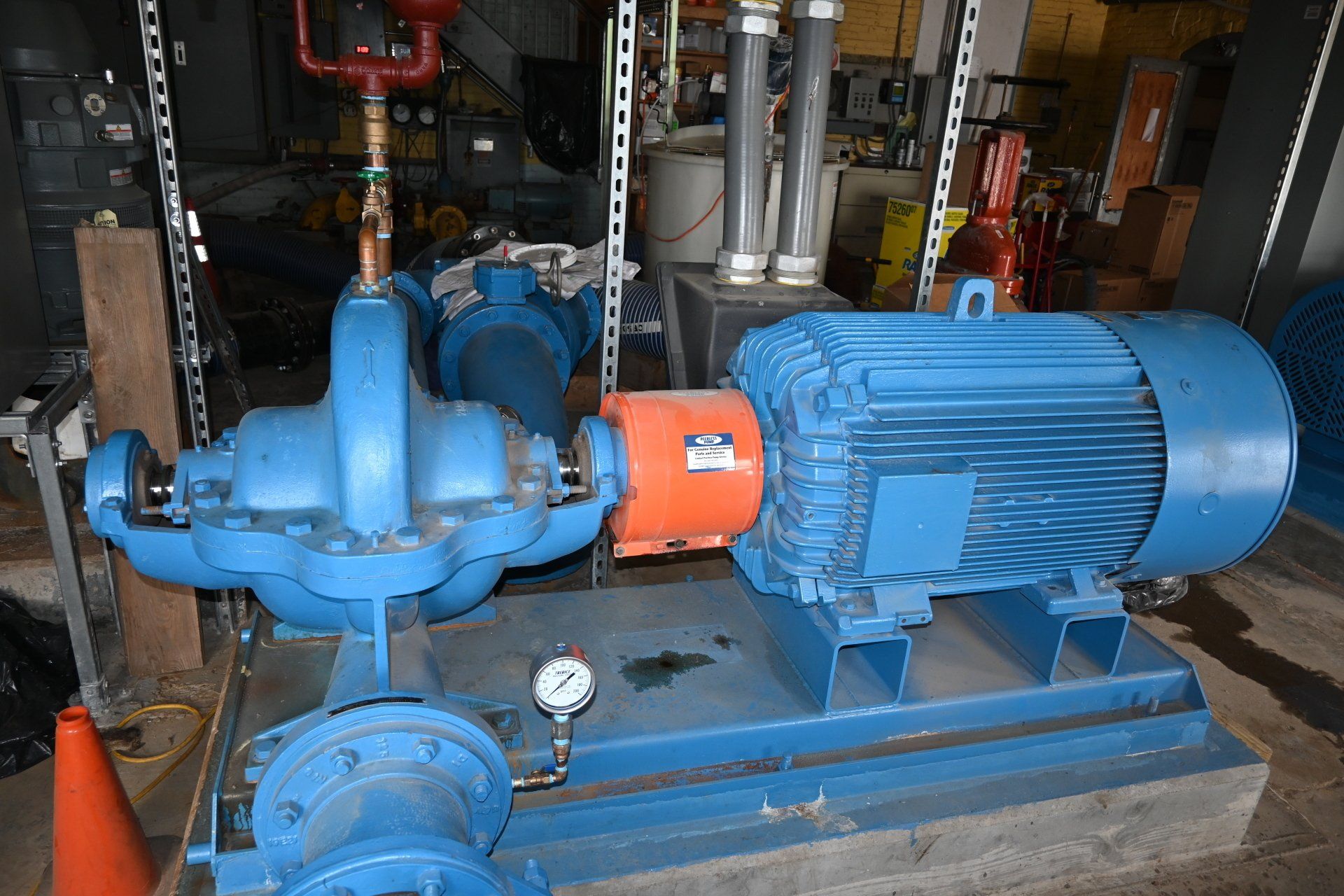 A blue pump with an orange motor attached to it