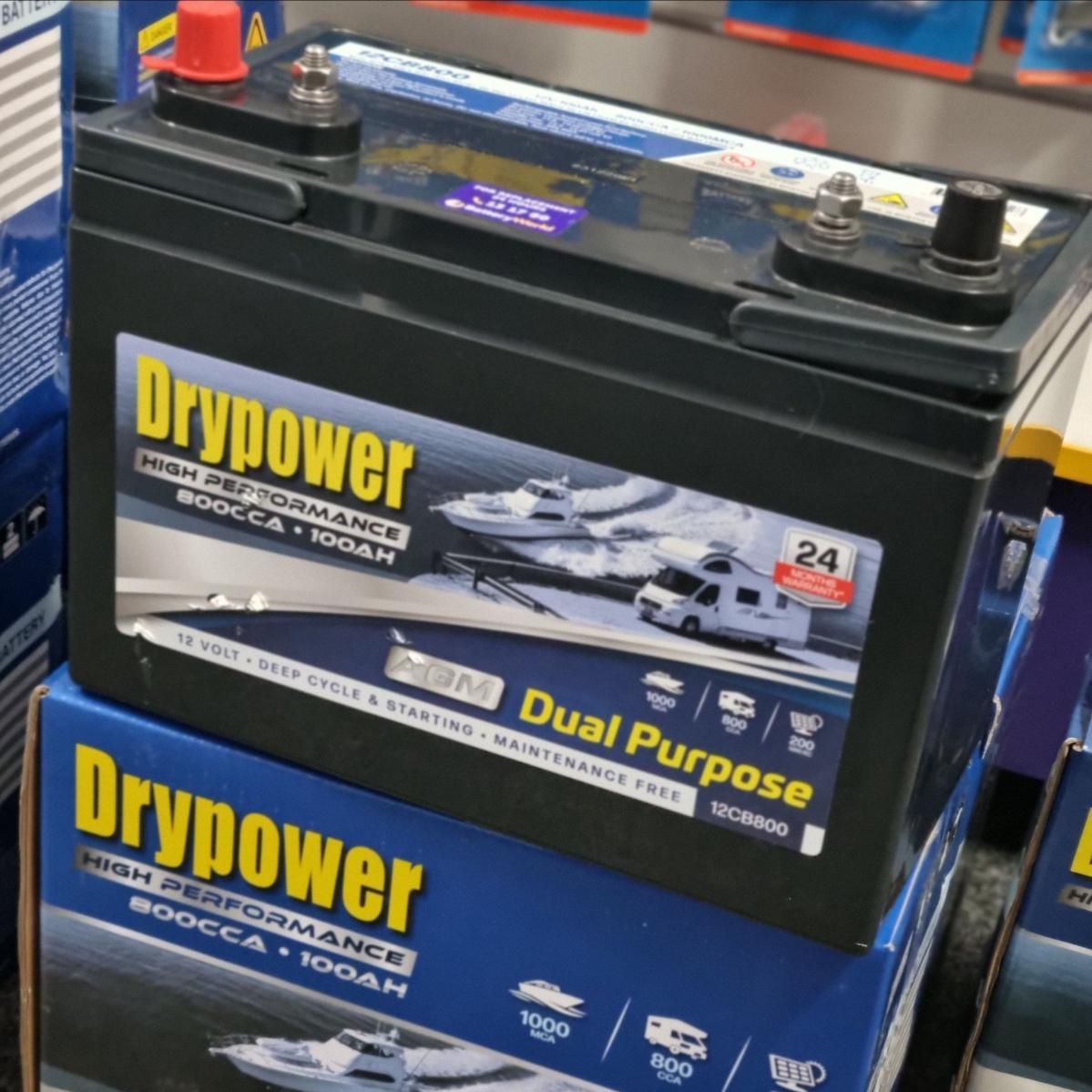Two Boxes of Drypower Batteries Are Stacked on Top of Each Other — Battery World Townsville In Garbutt, QLD