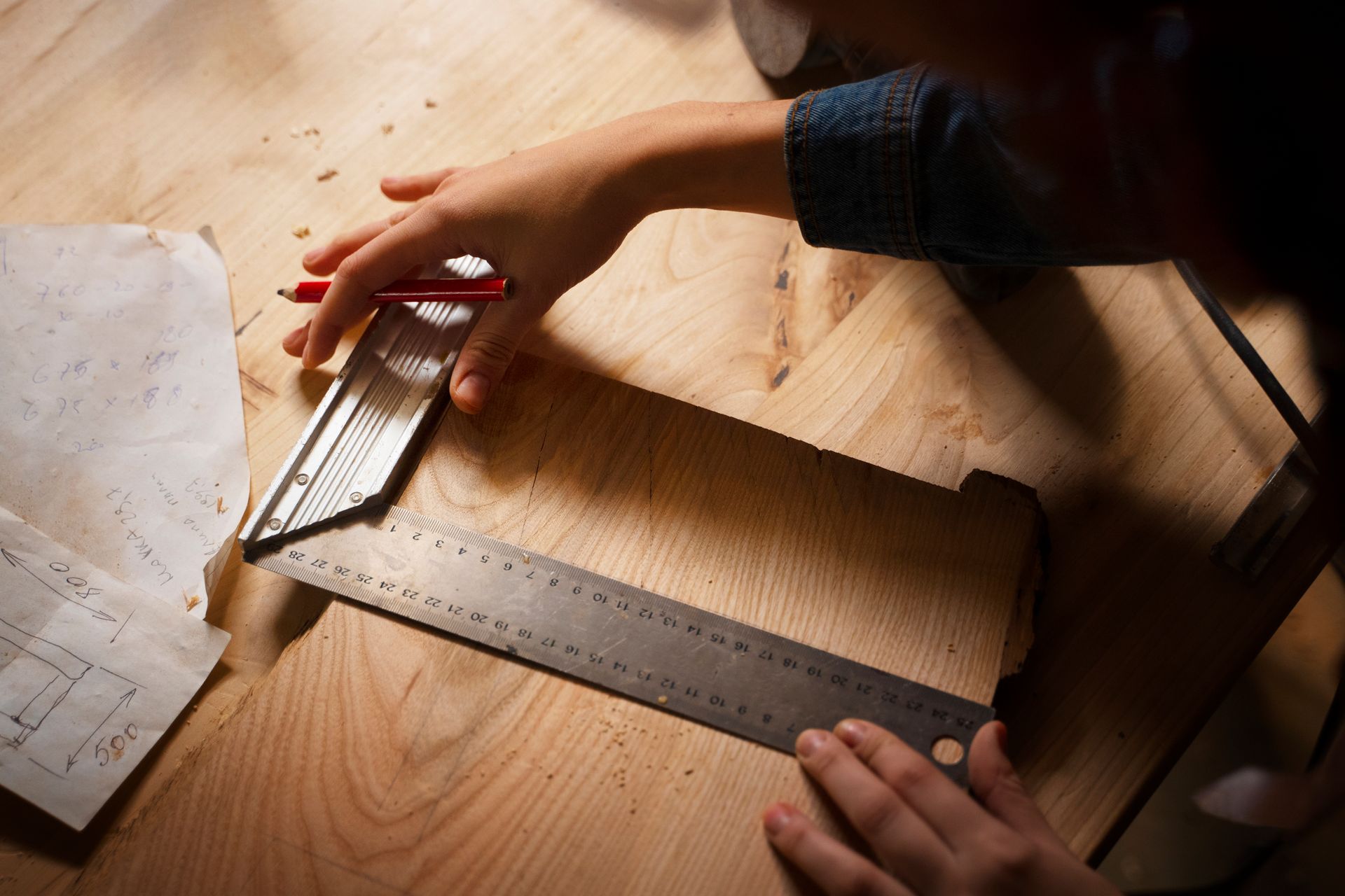 A Carpenter taking measurements