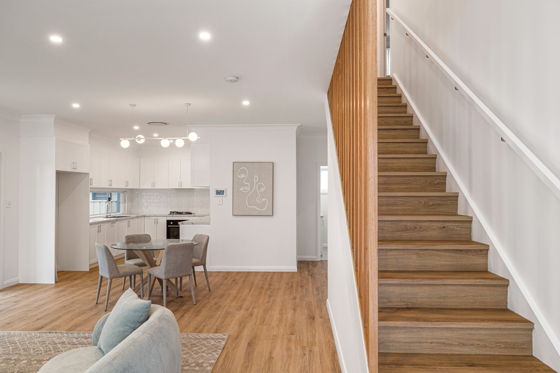 Custom Designed Duplex Living Area with a Staircase
