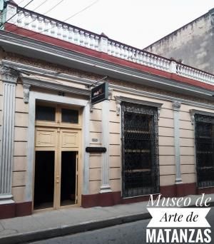 A building with a sign that says museo de arte de matanzas