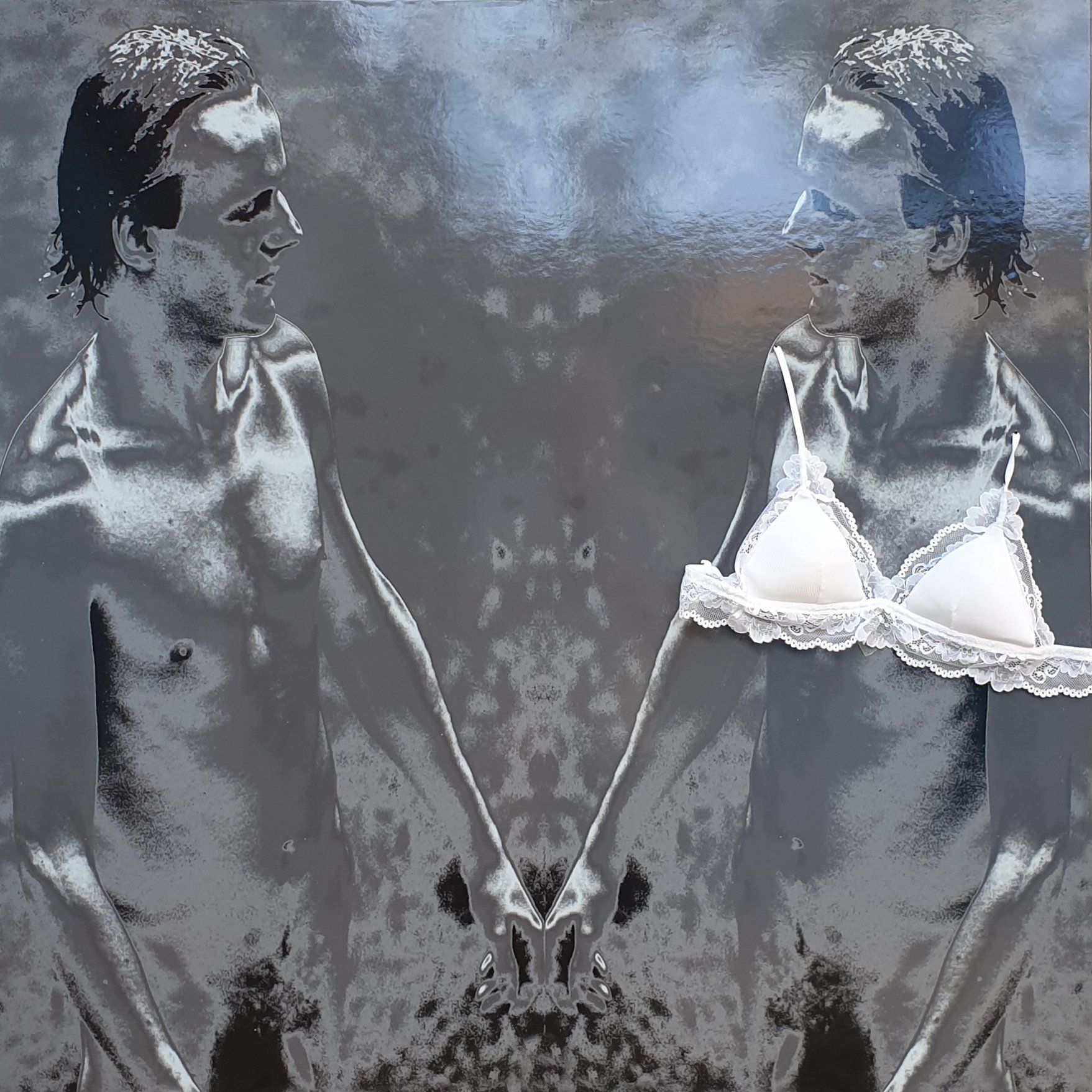 a black and white photo of two men  holding hands by artist Garbade