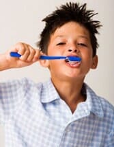 Boy brushing teeth — Teeth Cleaning in Cheyenne, WY