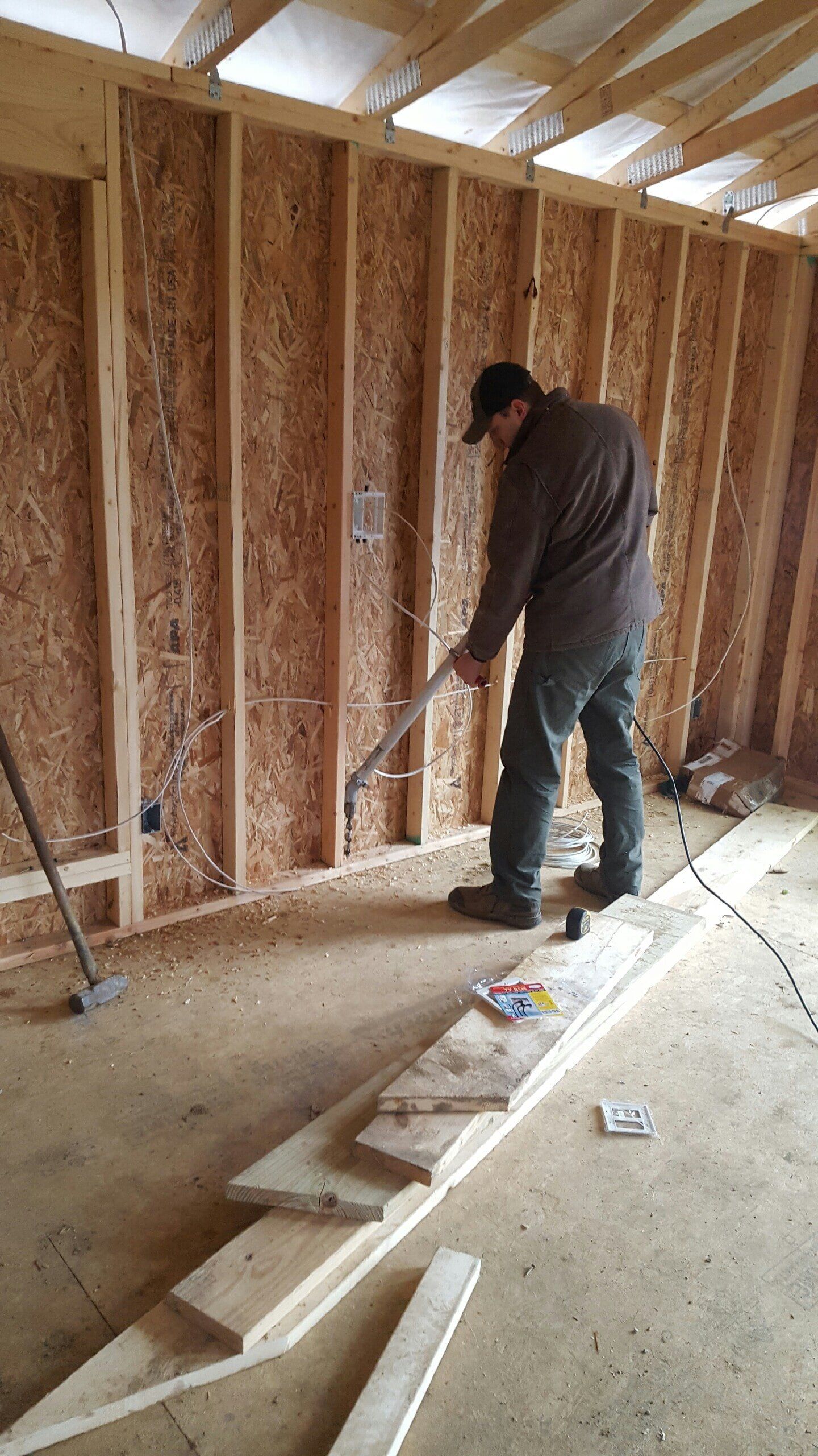 Man fixing wire — New Construction in Beaver, PA