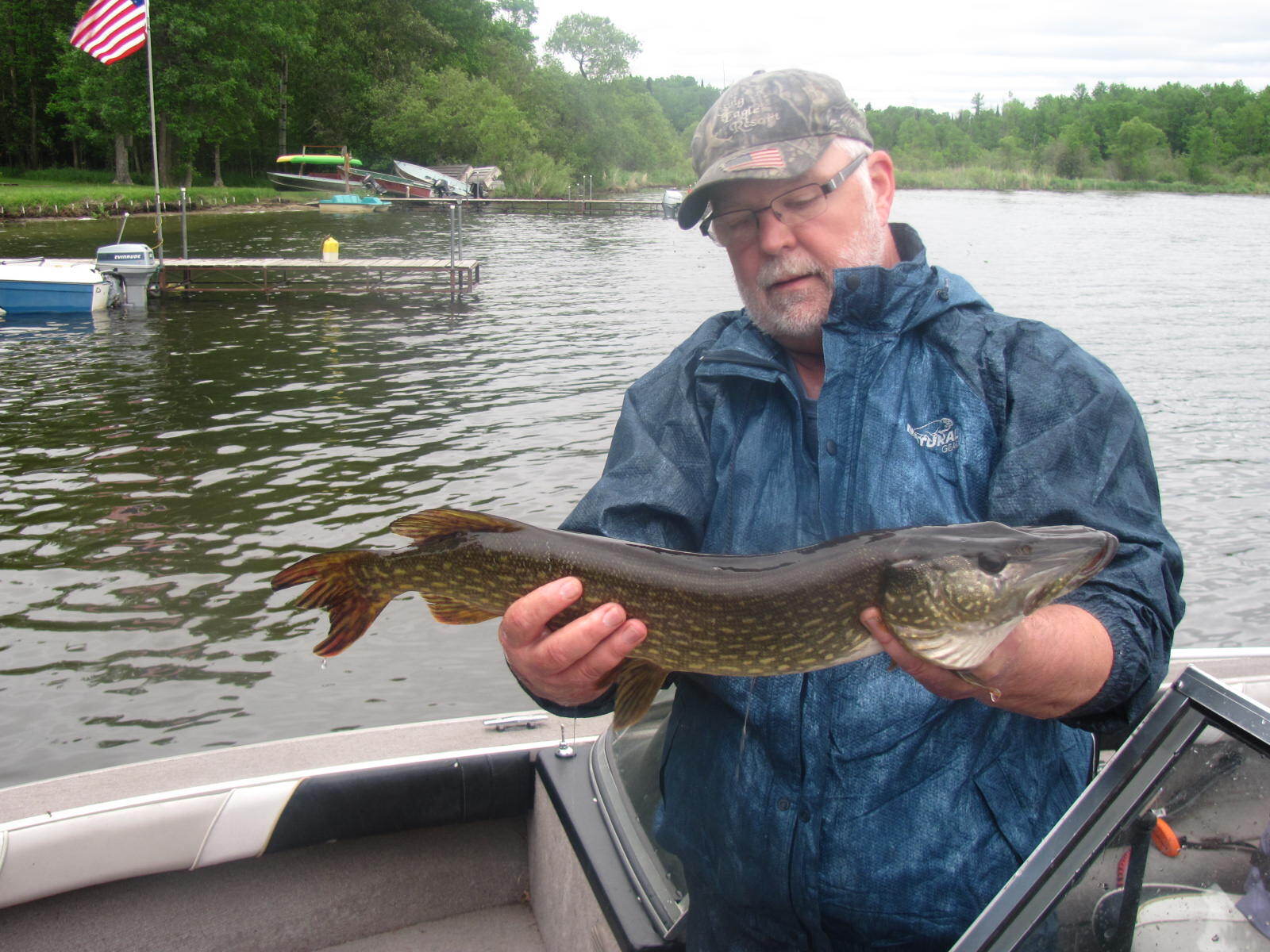 man-showing-caught-fish