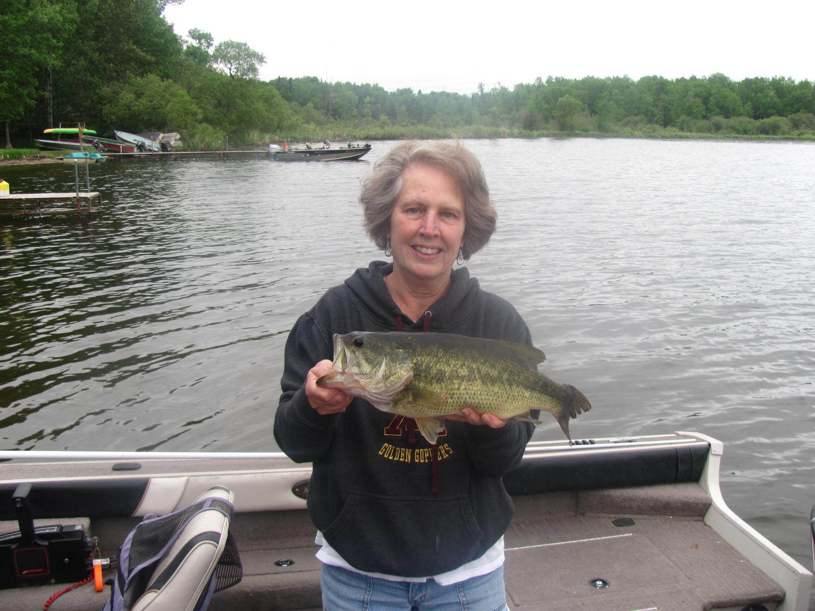 woman-showing-caught-fish