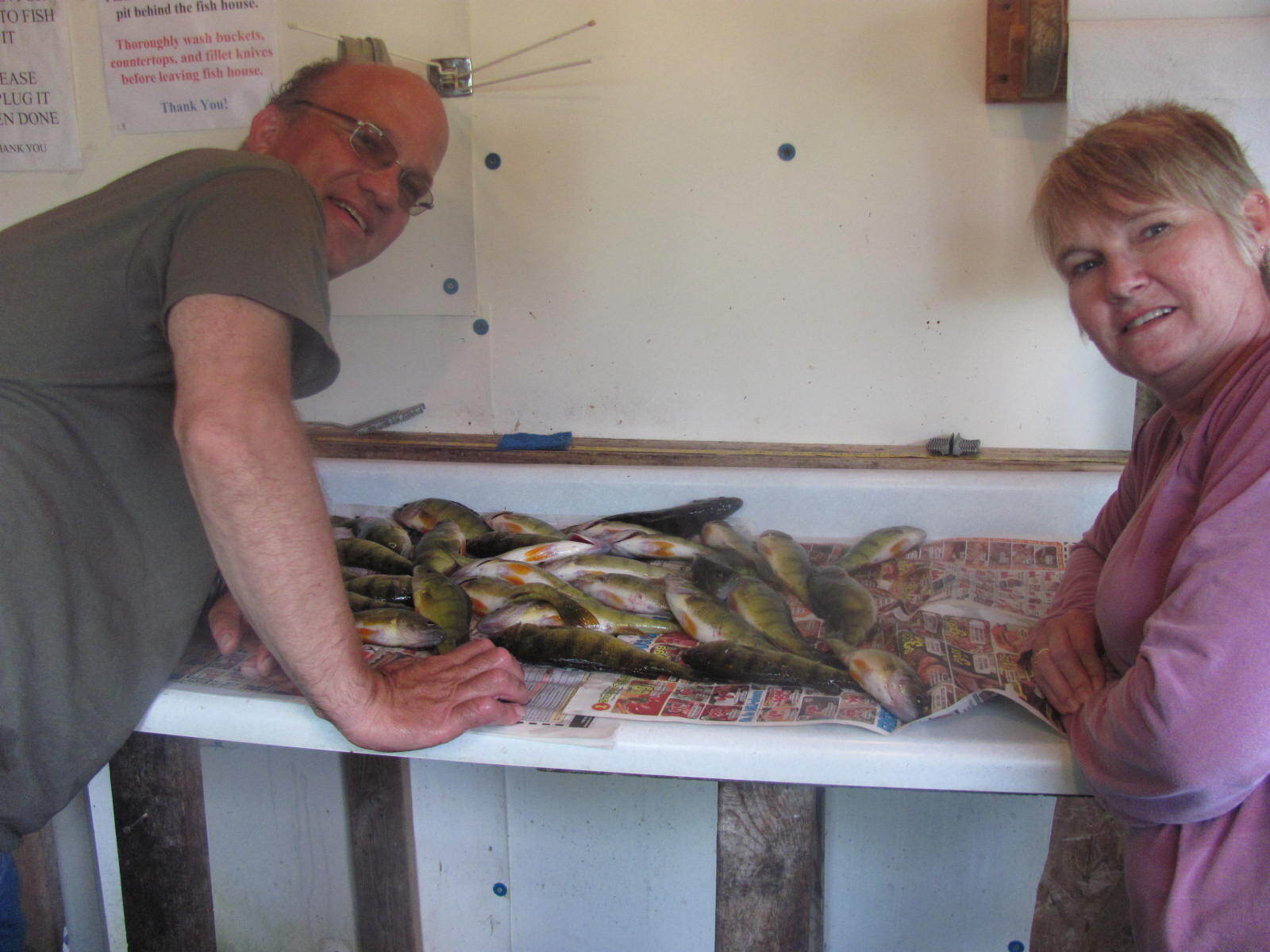 man-showing-caught-fish