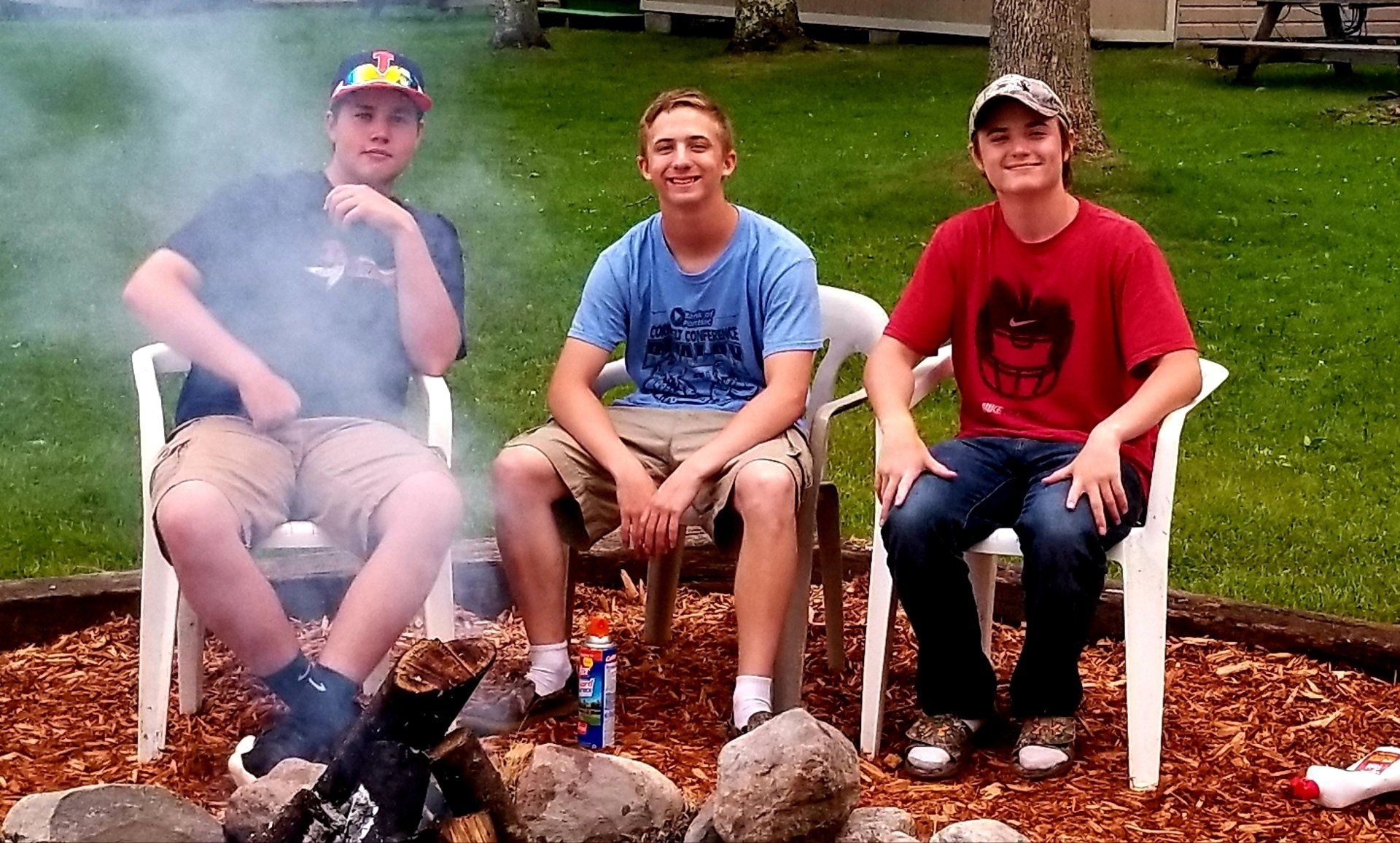 boys-around-camp-fire