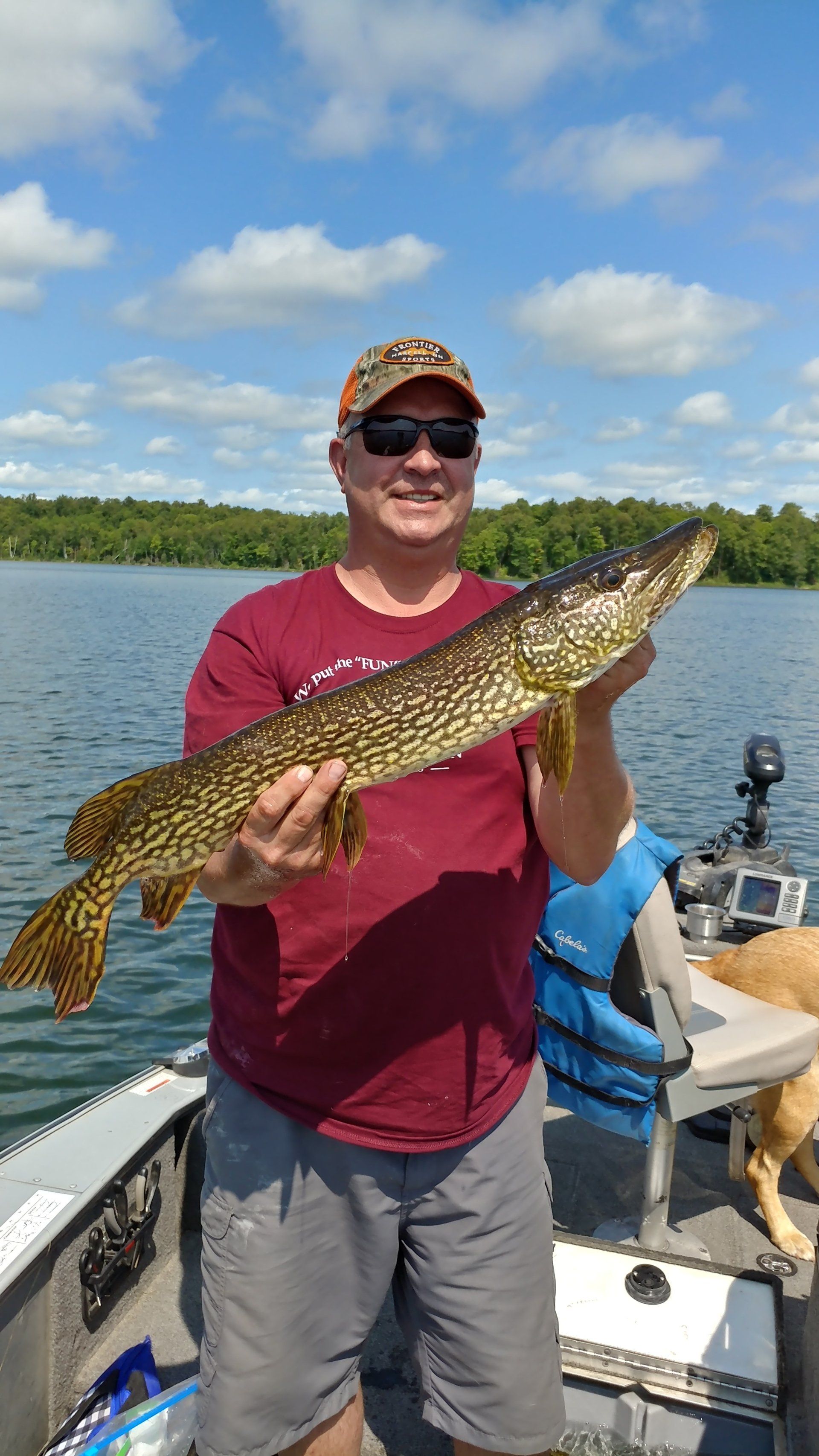 man-showing-caught-fish