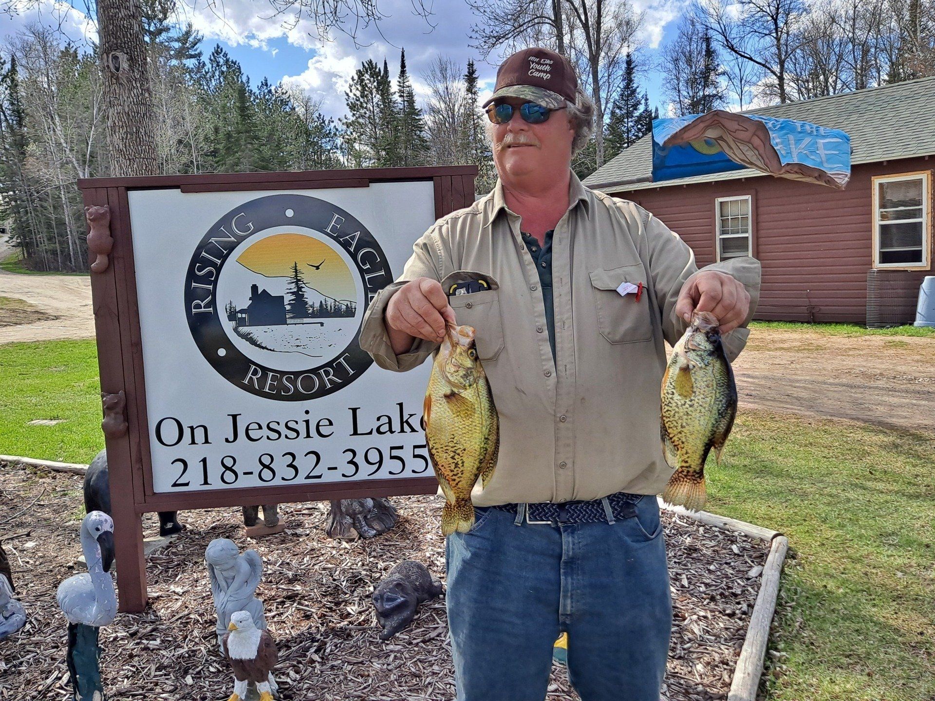 man-showing-caught-fish