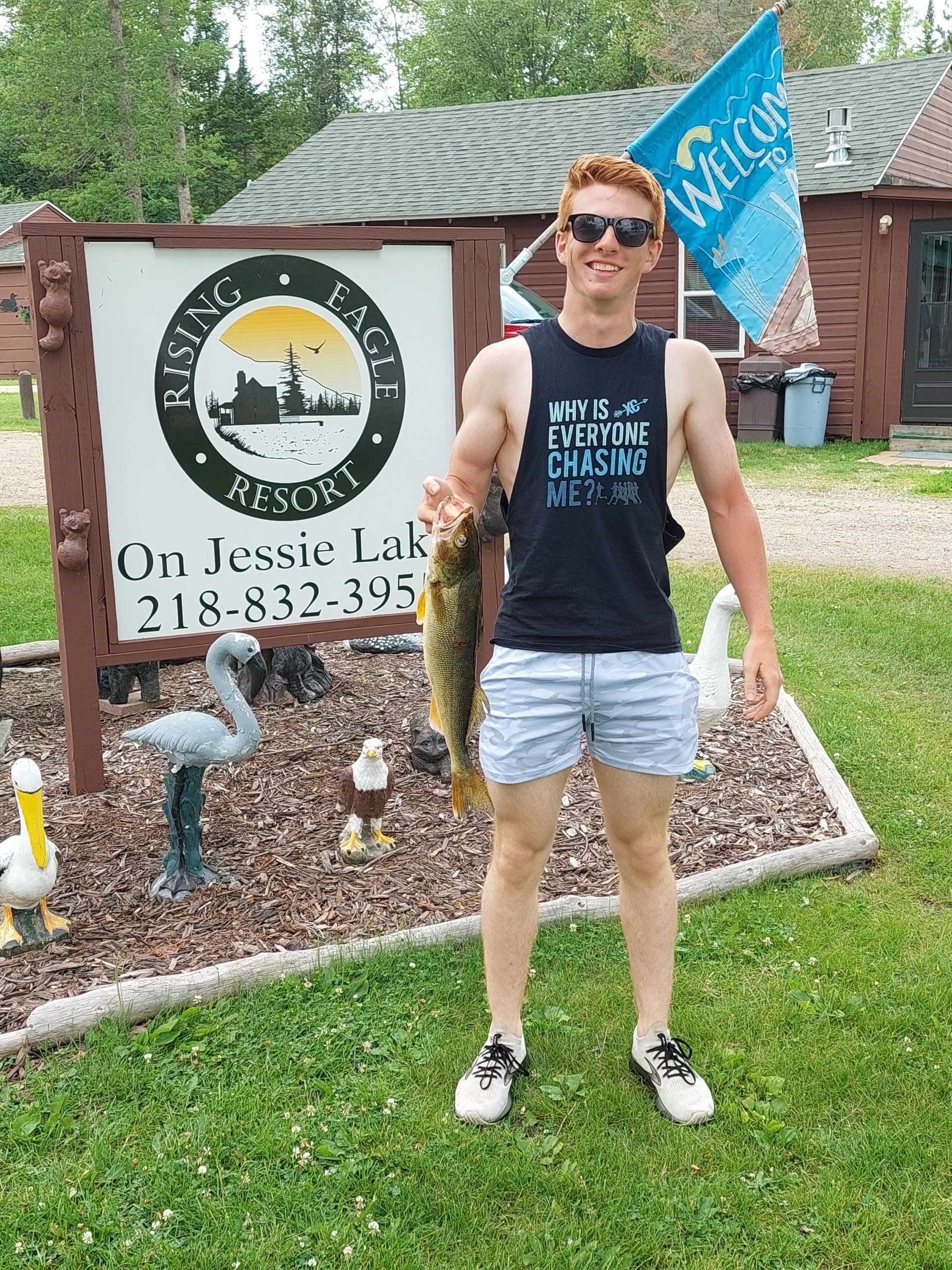 man-showing-caught-fish