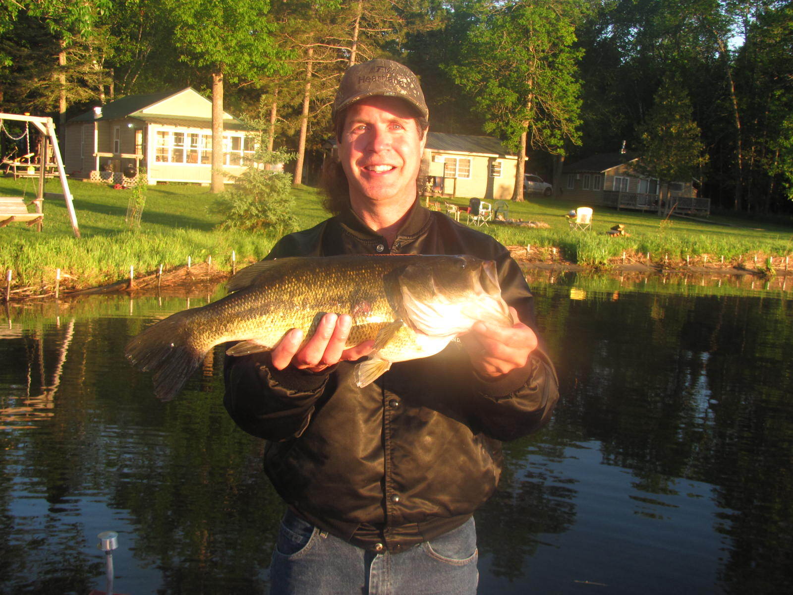 man-showing-caught-fish