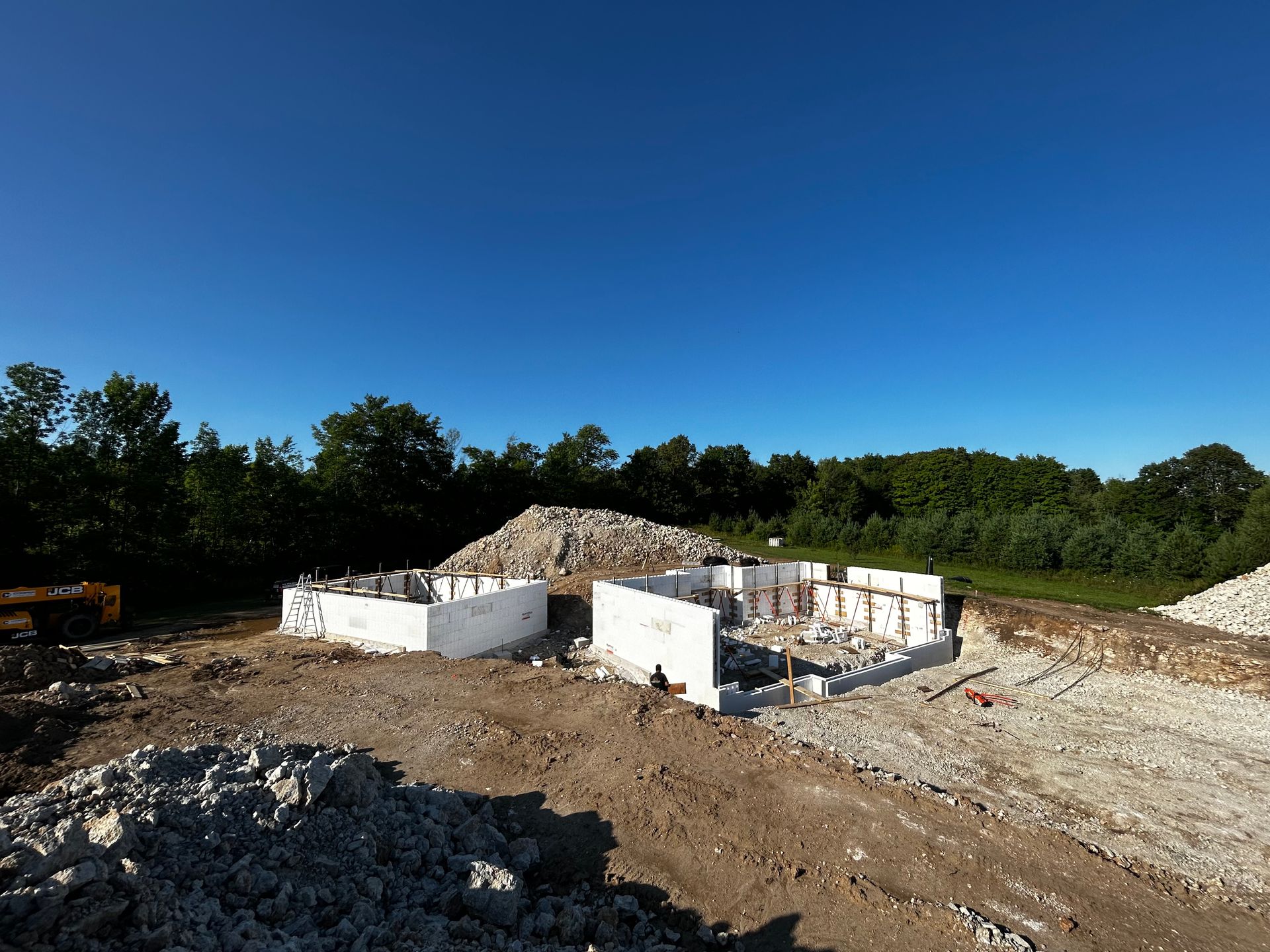 A construction site with a blue sky in the background