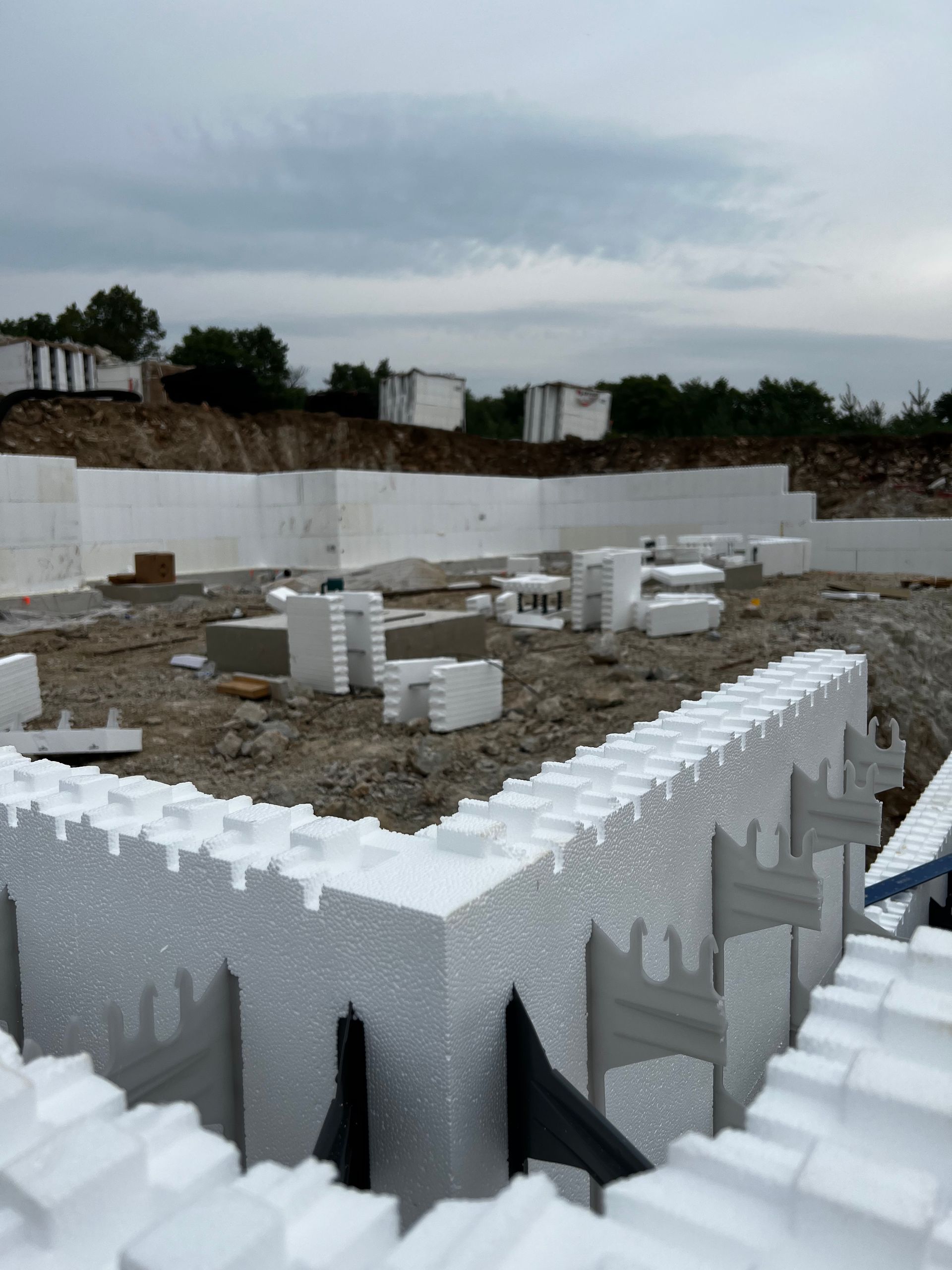 A lot of styrofoam blocks are laying on the ground